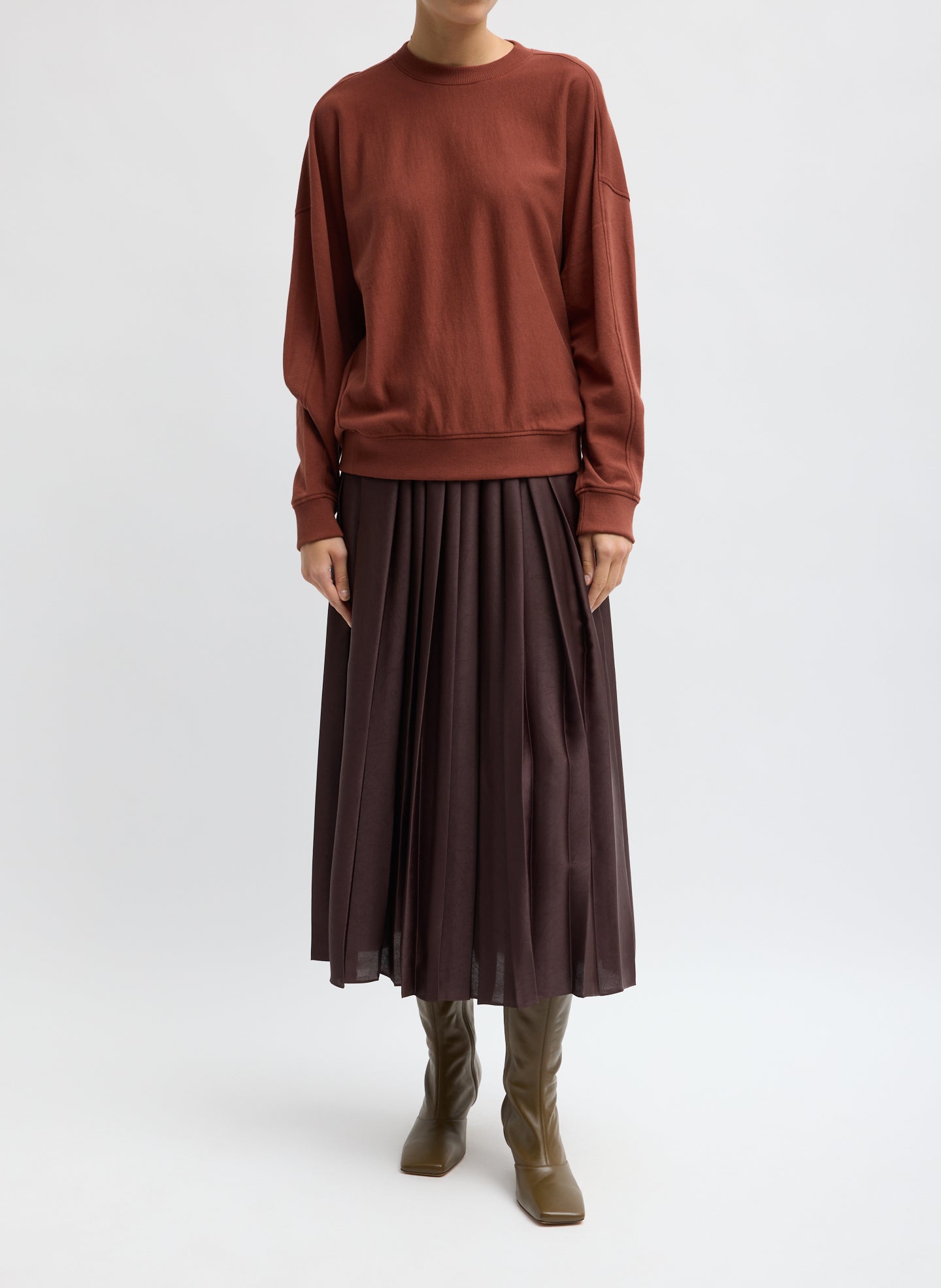 Feather Weight Pleated Pull On Skirt - Brown Feather Weight Pleated Pull On Skirt - front view on model