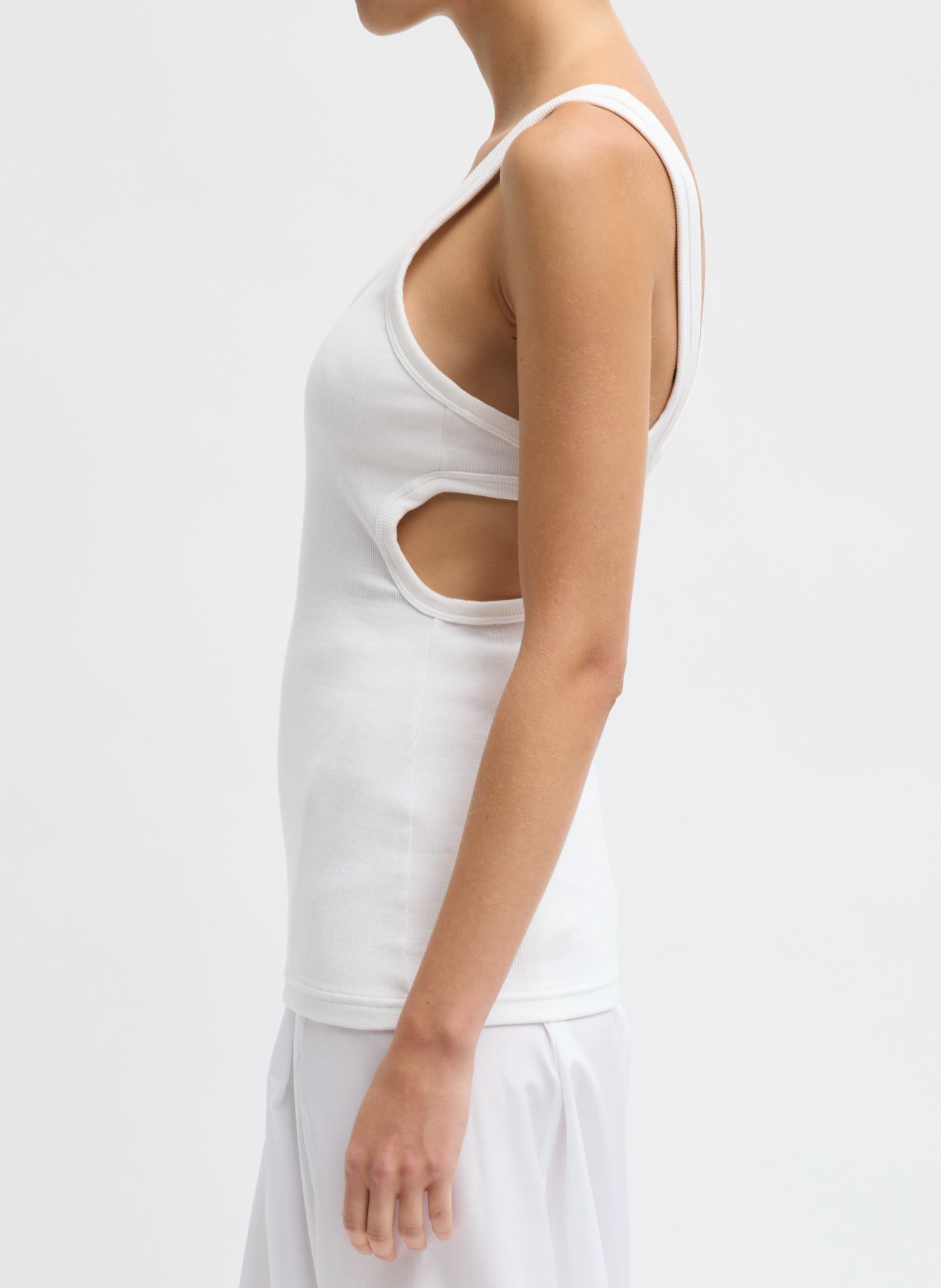 White Ribbed Racerback Tank - side view on model