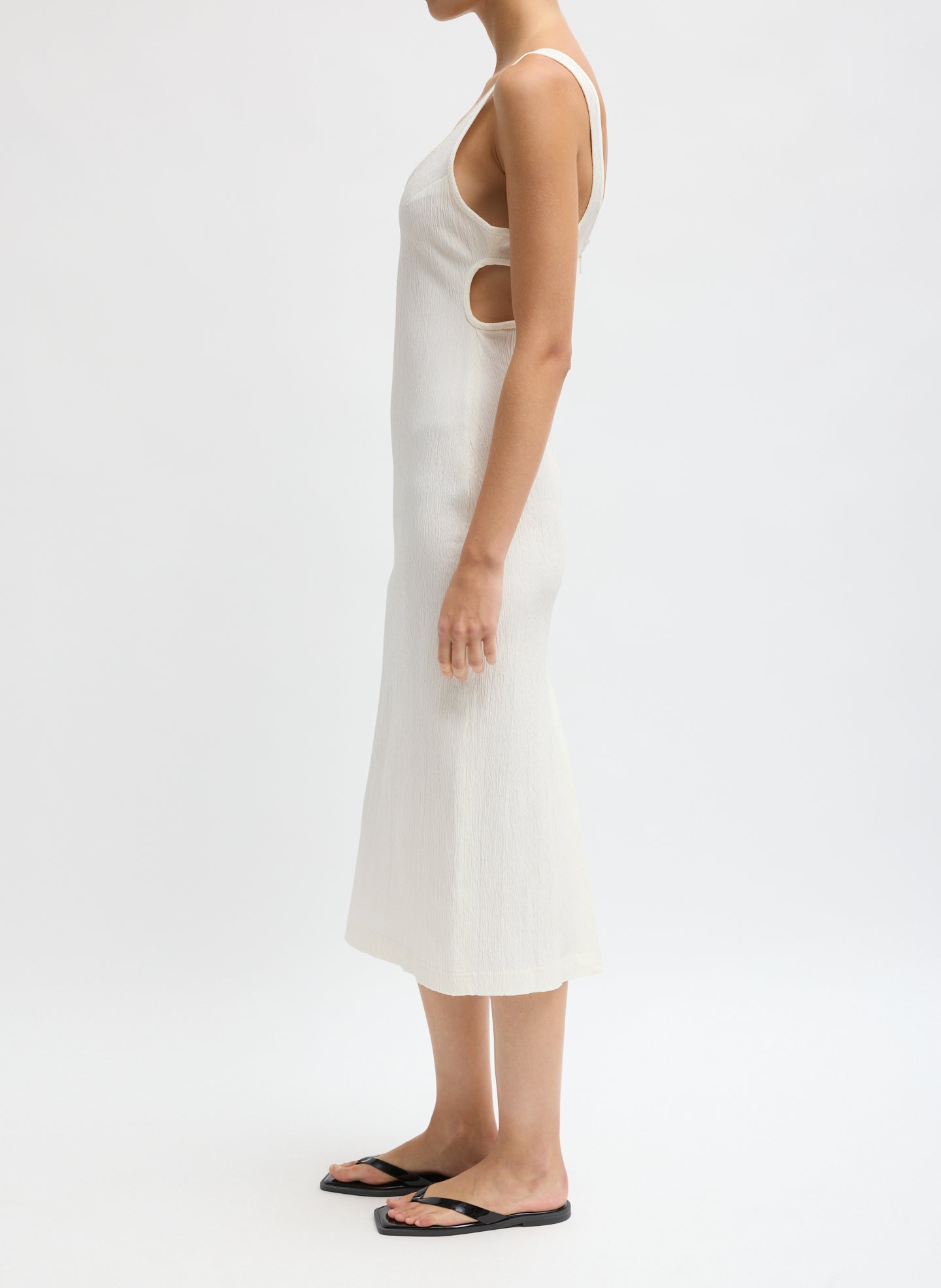 Ivory Creased Stretch Crepe Racerback Dress - side view on model