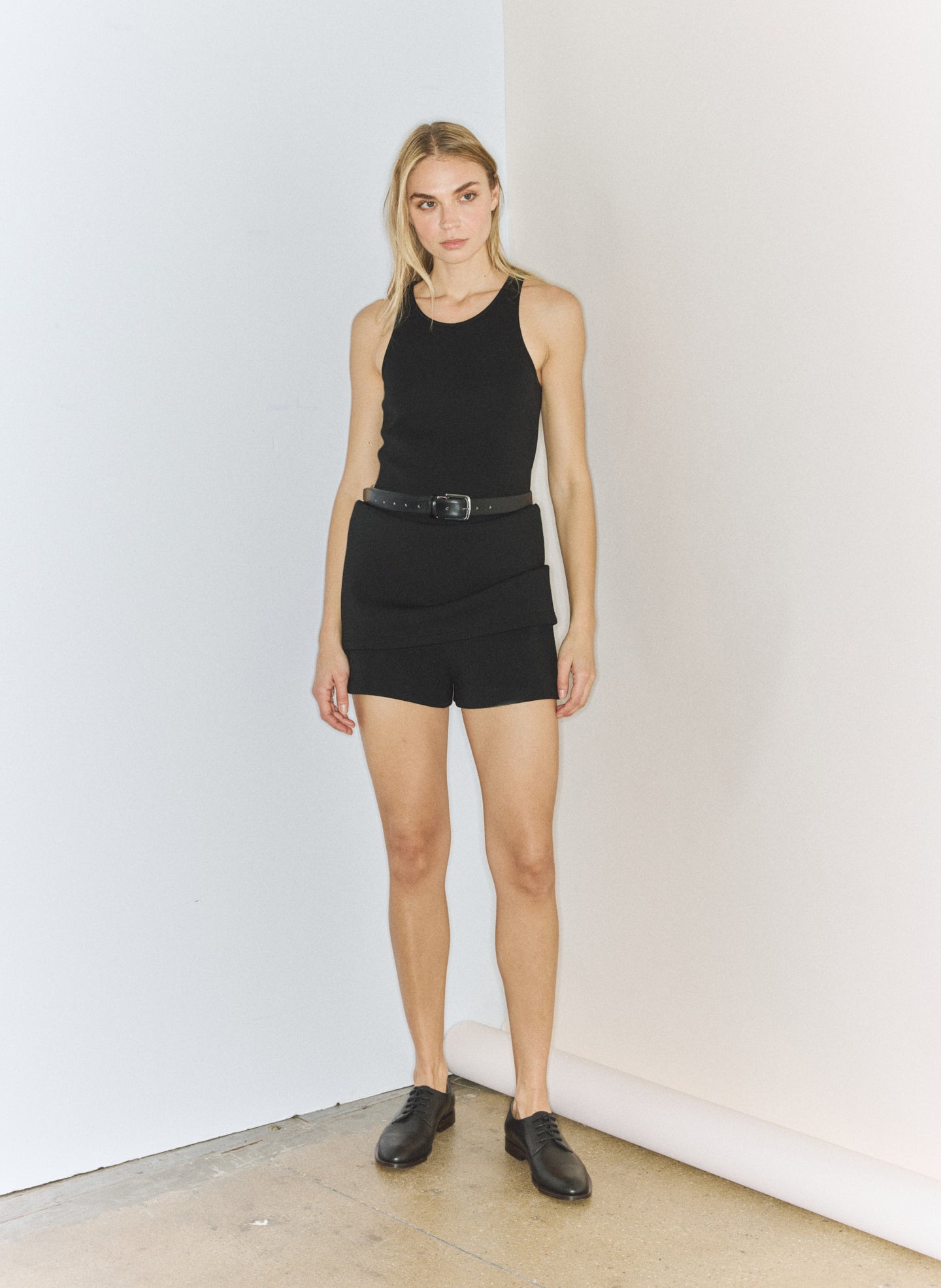 Black Bonded Viscose Sculpted Sleeveless Tunic - editorial image on model