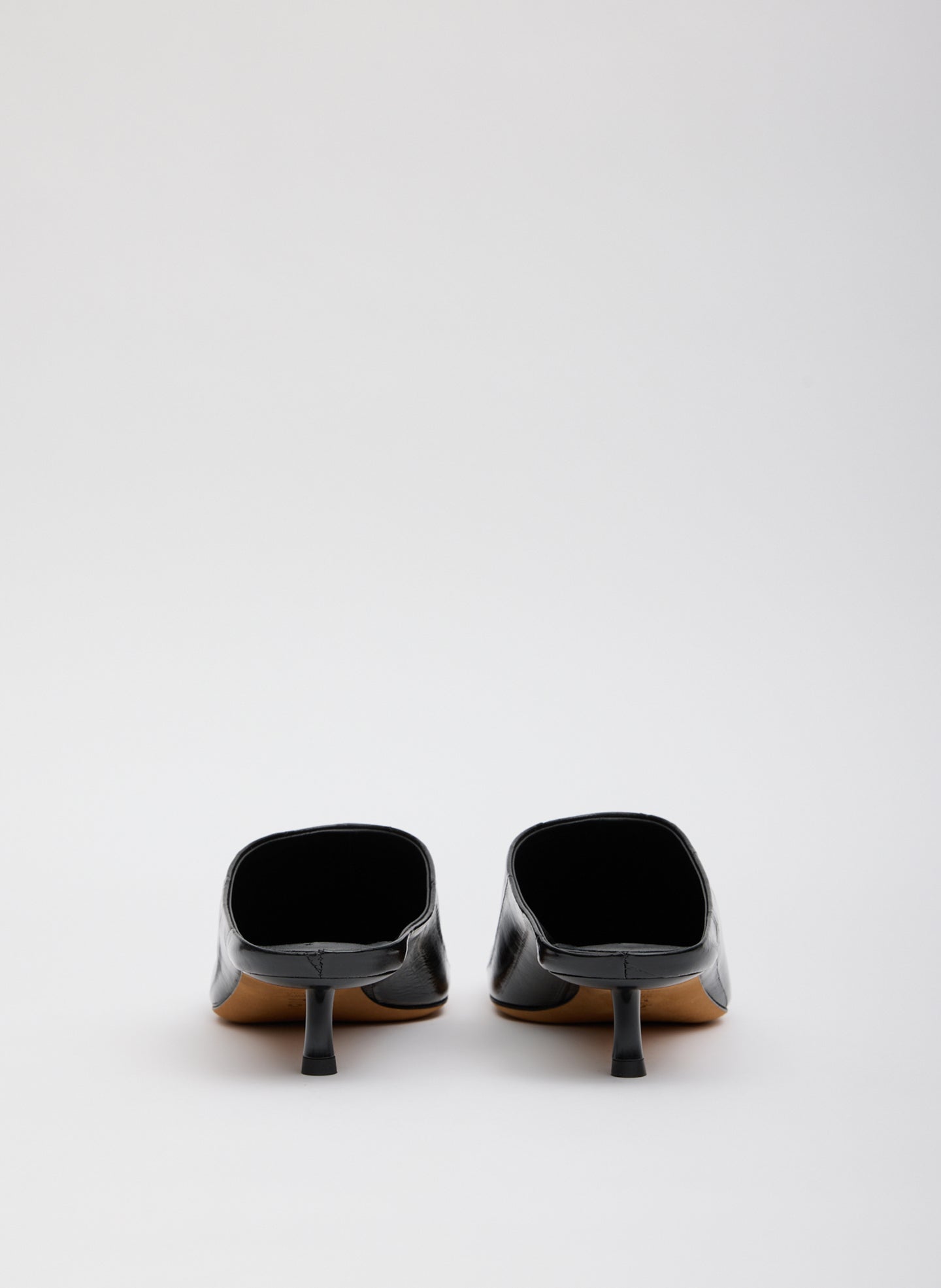 Black Eel Skin Gwinnett Heeled Mules - back view