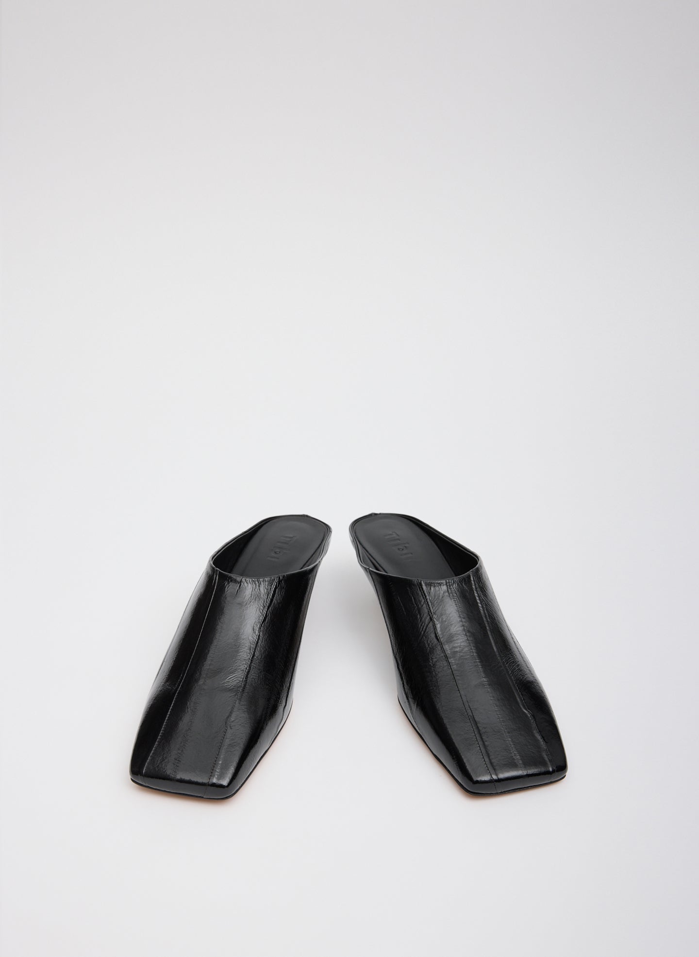 Black Eel Skin Gwinnett Heeled Mules - front view