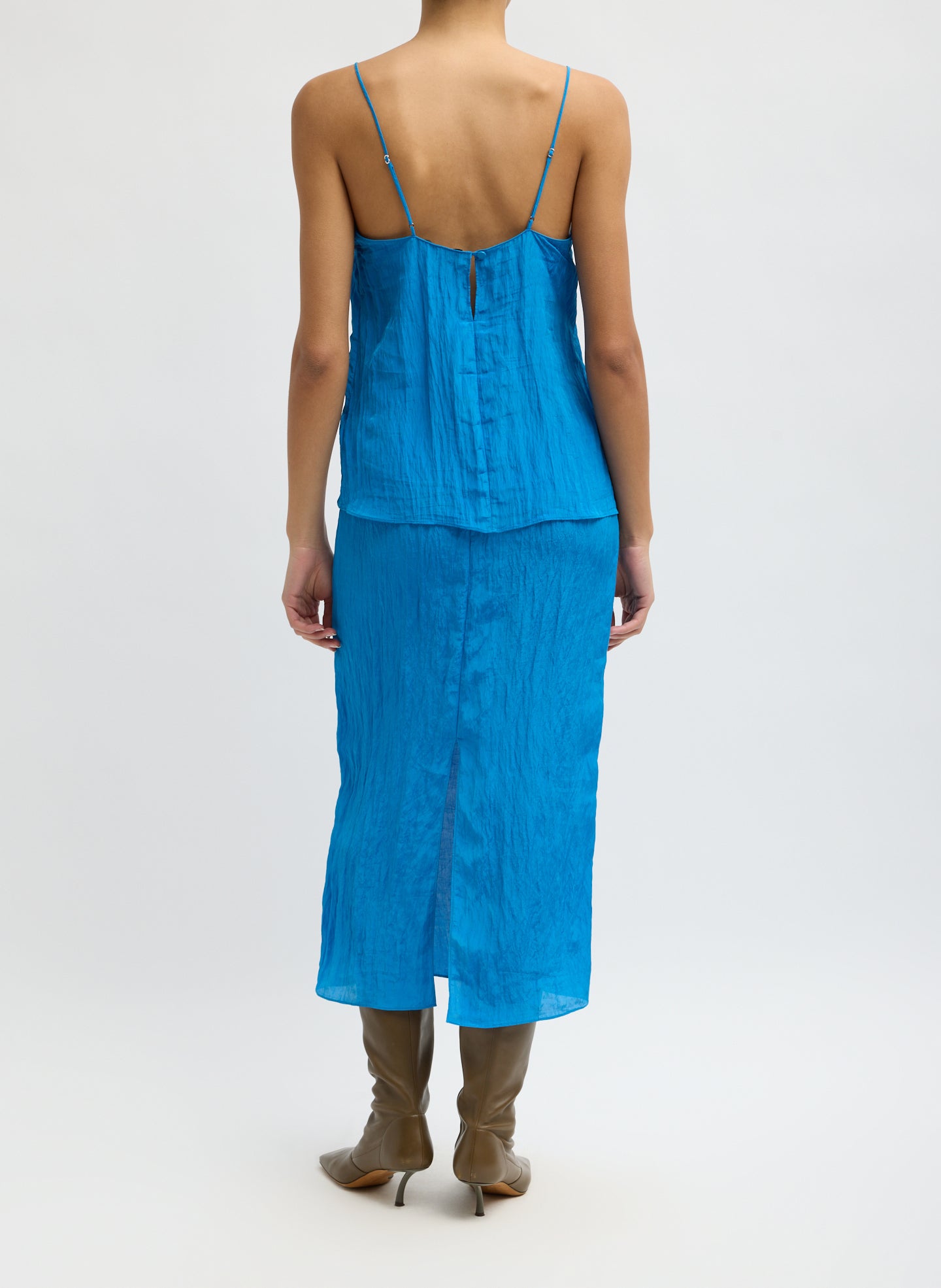 Bright Blue Crinkle Slip Skirt - midi slip skirt, back view on model
