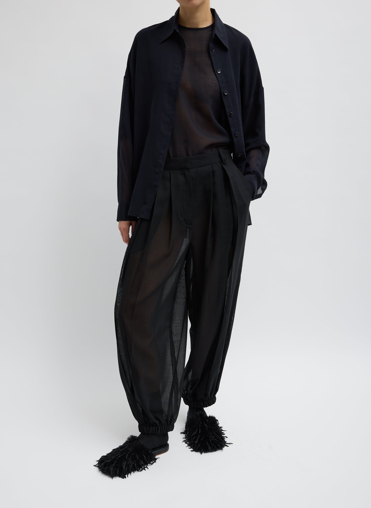 Black Sheer Wool Gauze Pleated Balloon Pant – relaxed fit, front view on model