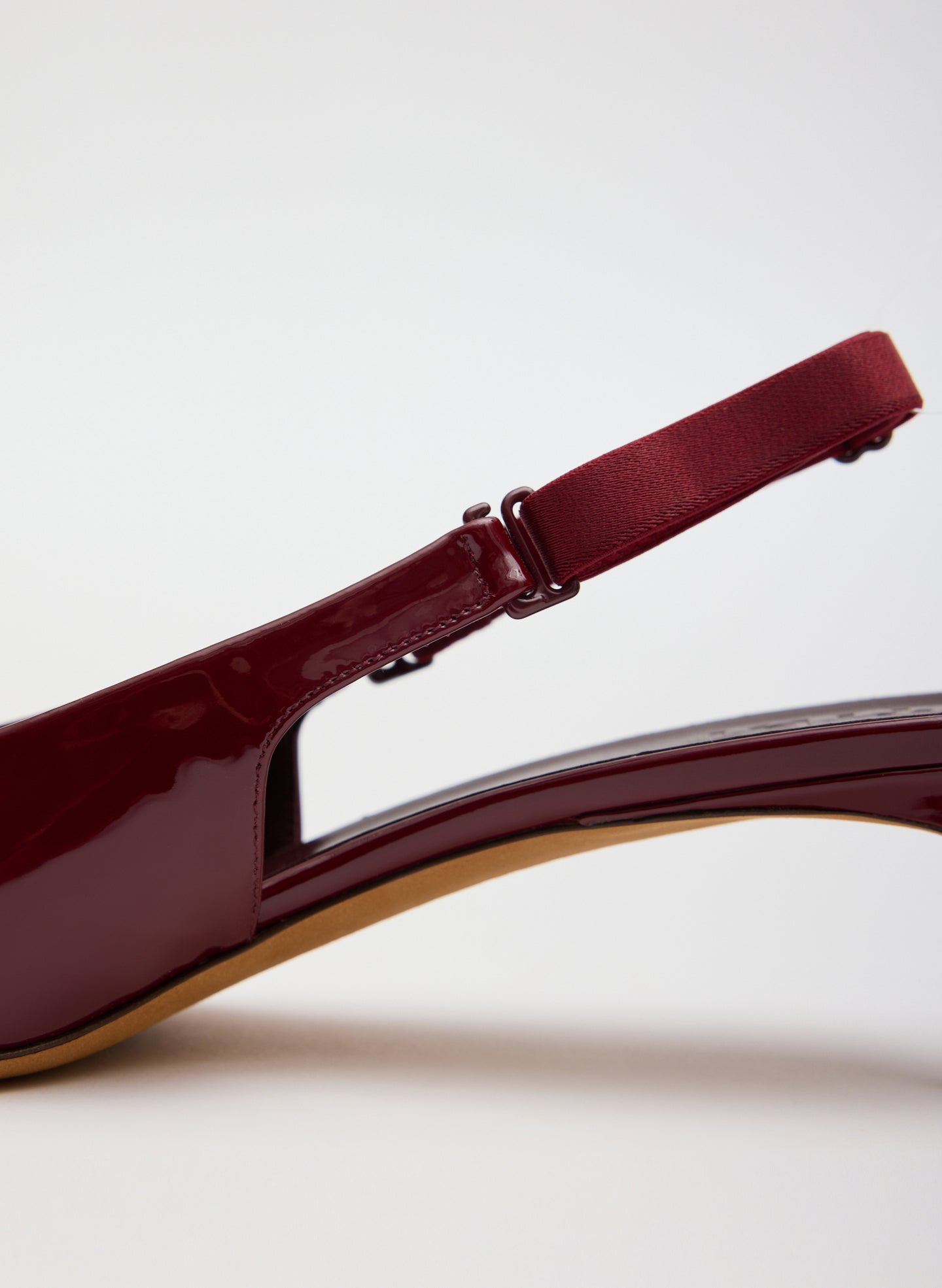 Burgundy Patent Leather Gilbert Low Pump - closeup of back strap