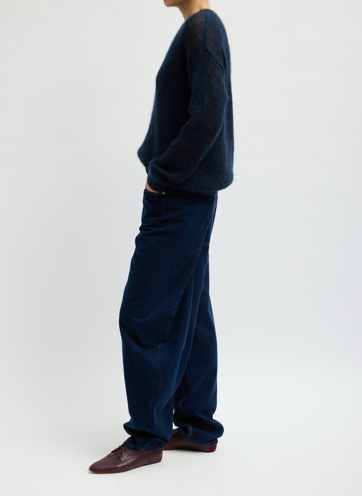 Indigo Tencel Cotton Denim Aleda Jean - barrel leg jean, side view on model