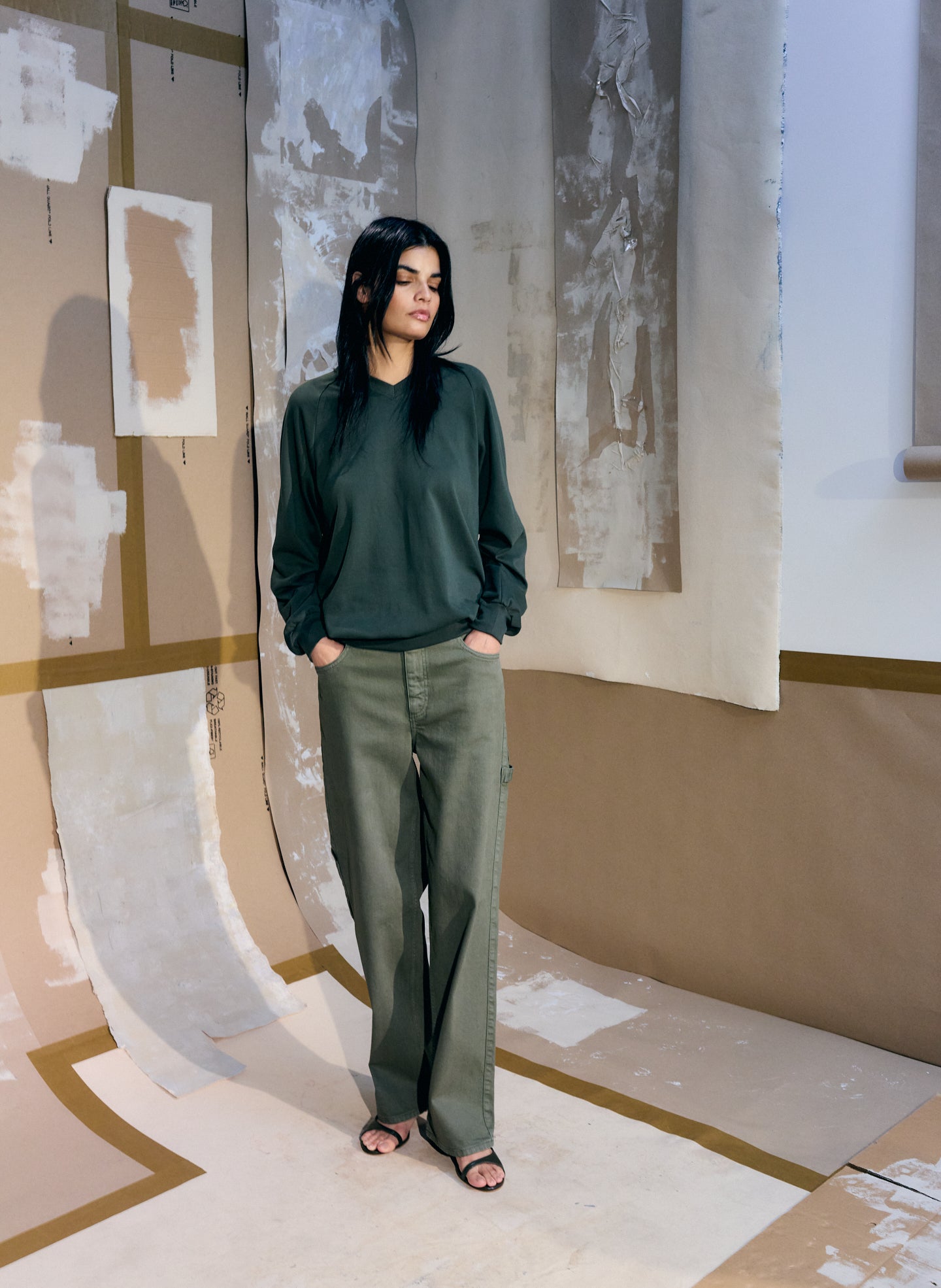 Dark Green Garment Wash Stretch Twill Slouchy Carpenter Jean + Vintage Sweatshirt - editorial image on model