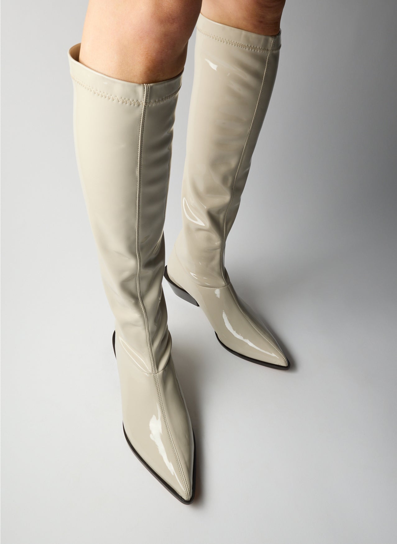 Taupe Bronson Boot - Narrow Calf - patent leather, knee high, pointed toe, on model