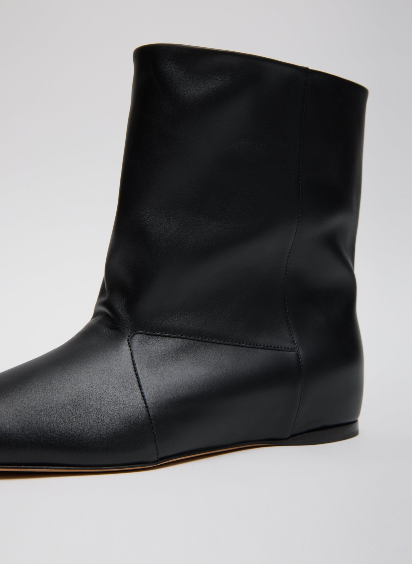 Black Bux Boot - closeup of leather and stitching details