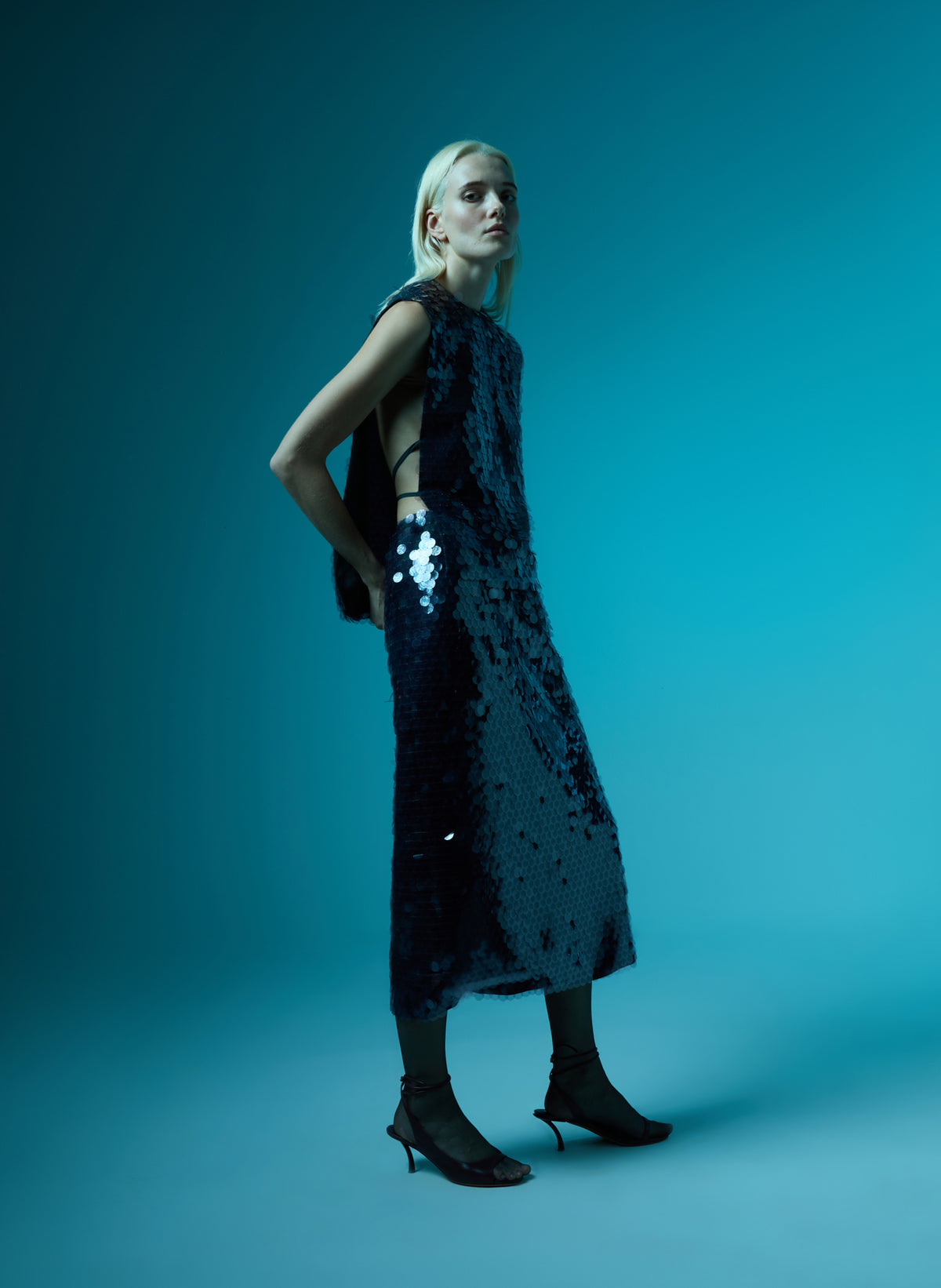 Lavender Grey Pastille Bib Top and Midi Skirt - purple sequin sleeveless top, editorial image on model