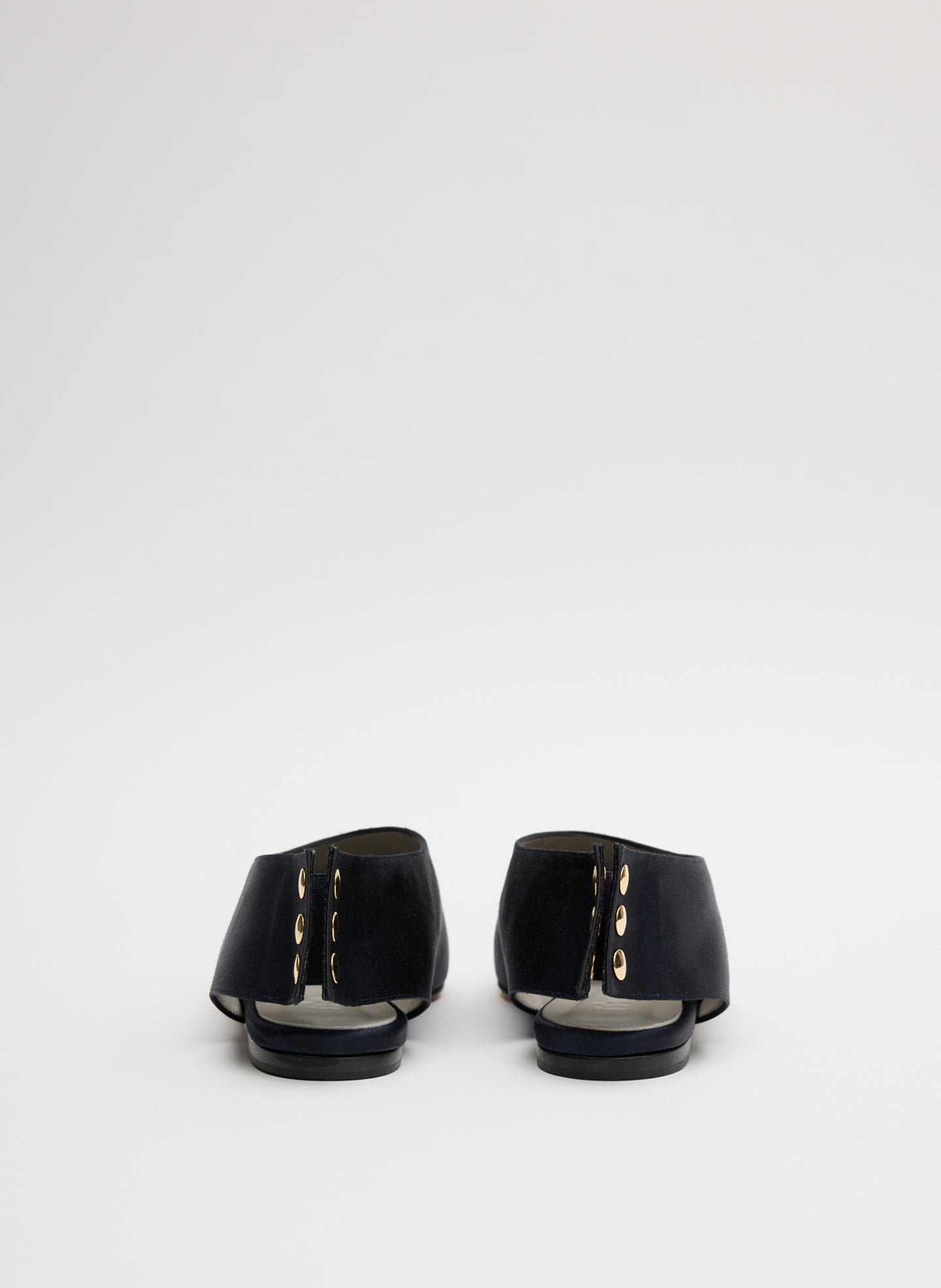 Navy Norbert Satin Flat - pointed toe, back view