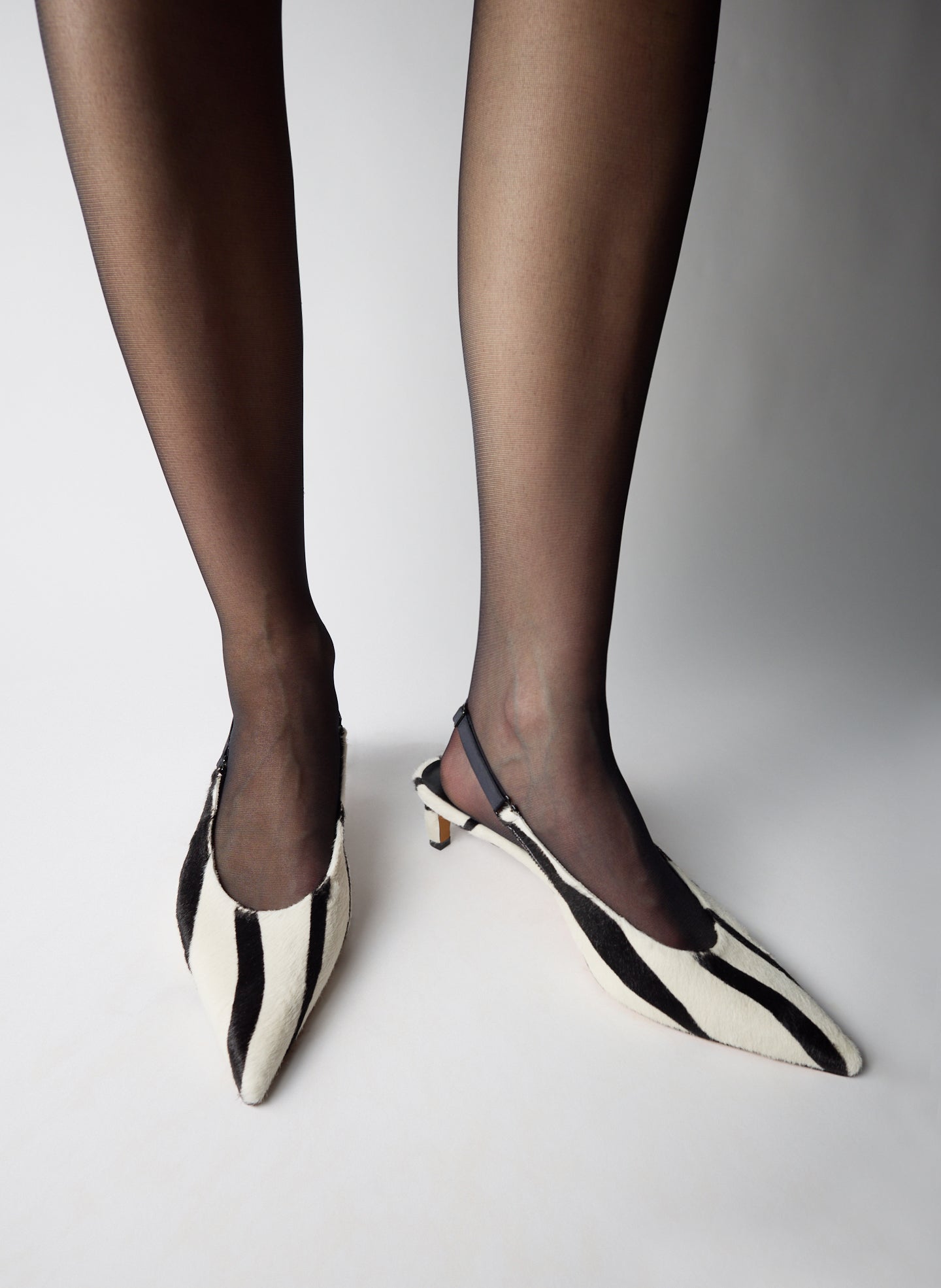 Black and White Zebra Print Calf Hair Gilbert Low Pump - on model
