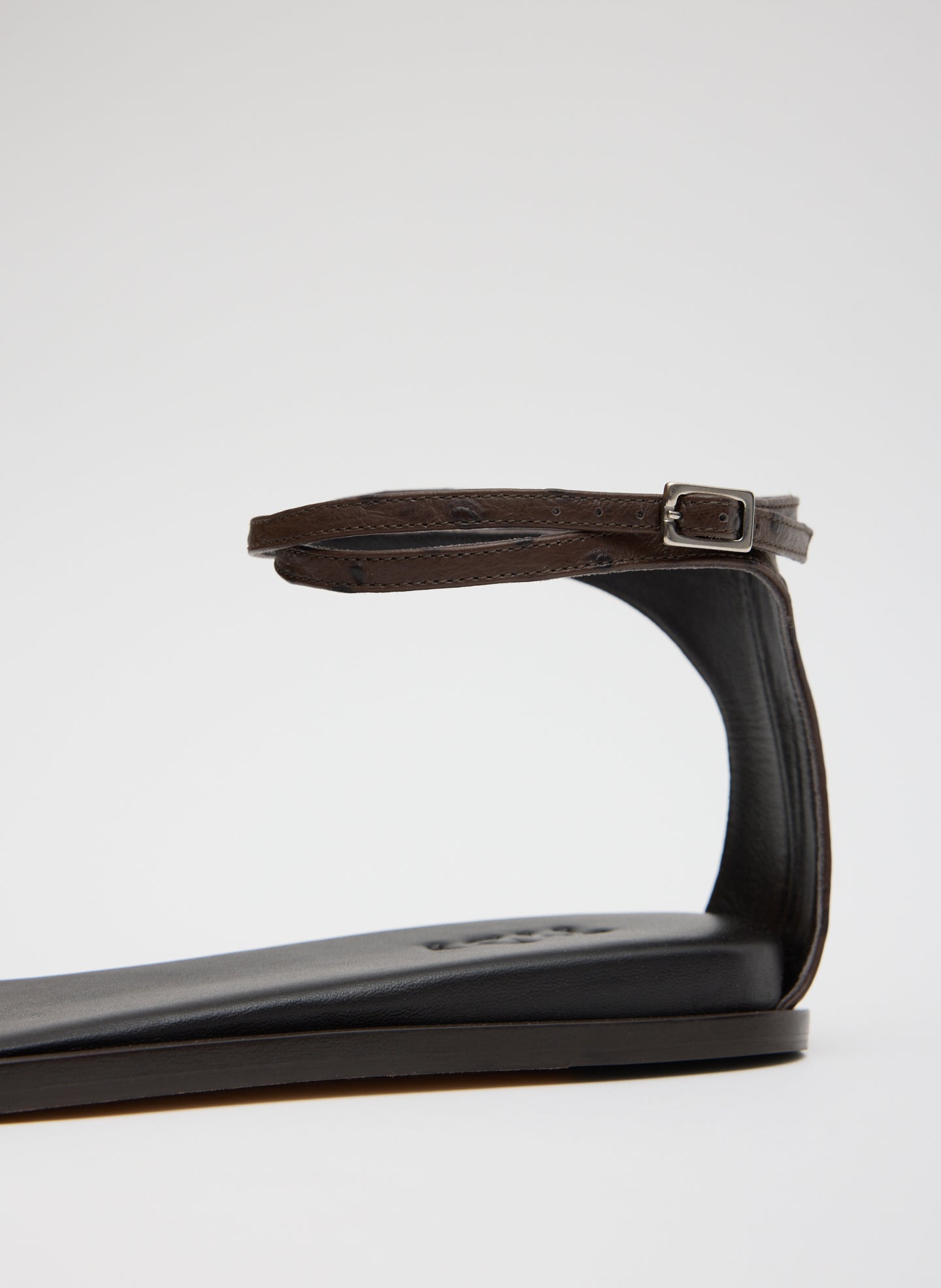 Brown Ostrich Print Aldwyn Sandal - closeup of strap detail