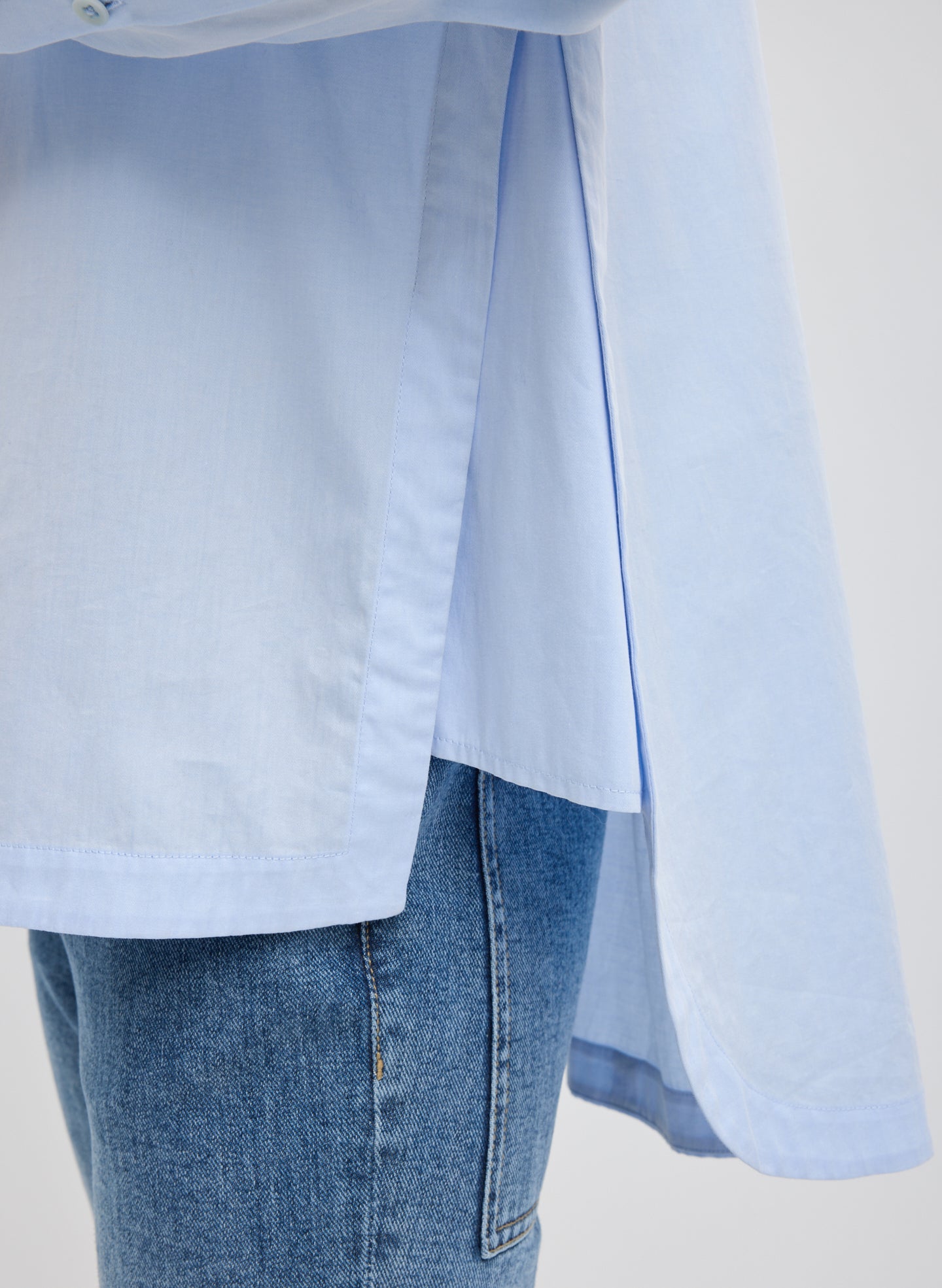 Light Blue Gabe Oversized Shirt - closeup of side slit