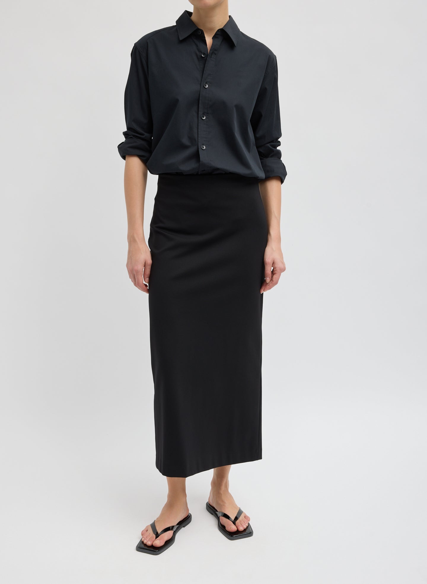 Black Compact Ultra Stretch Knit Pencil Skirt - front view on model