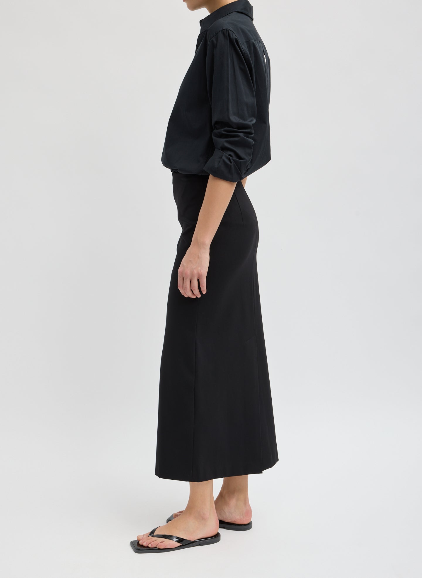 Black Compact Ultra Stretch Knit Pencil Skirt - side view on model