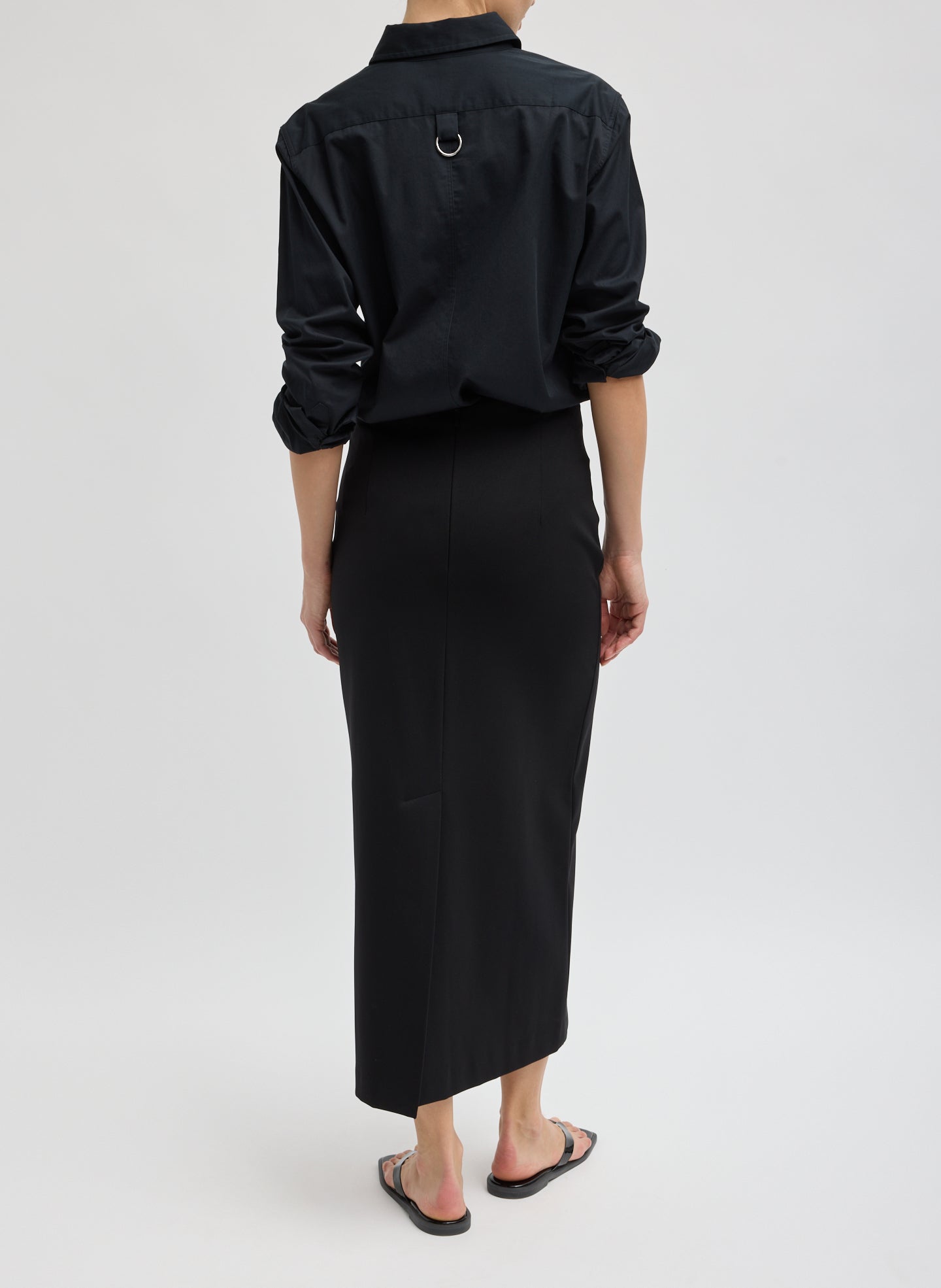 Black Compact Ultra Stretch Knit Pencil Skirt - back view on model