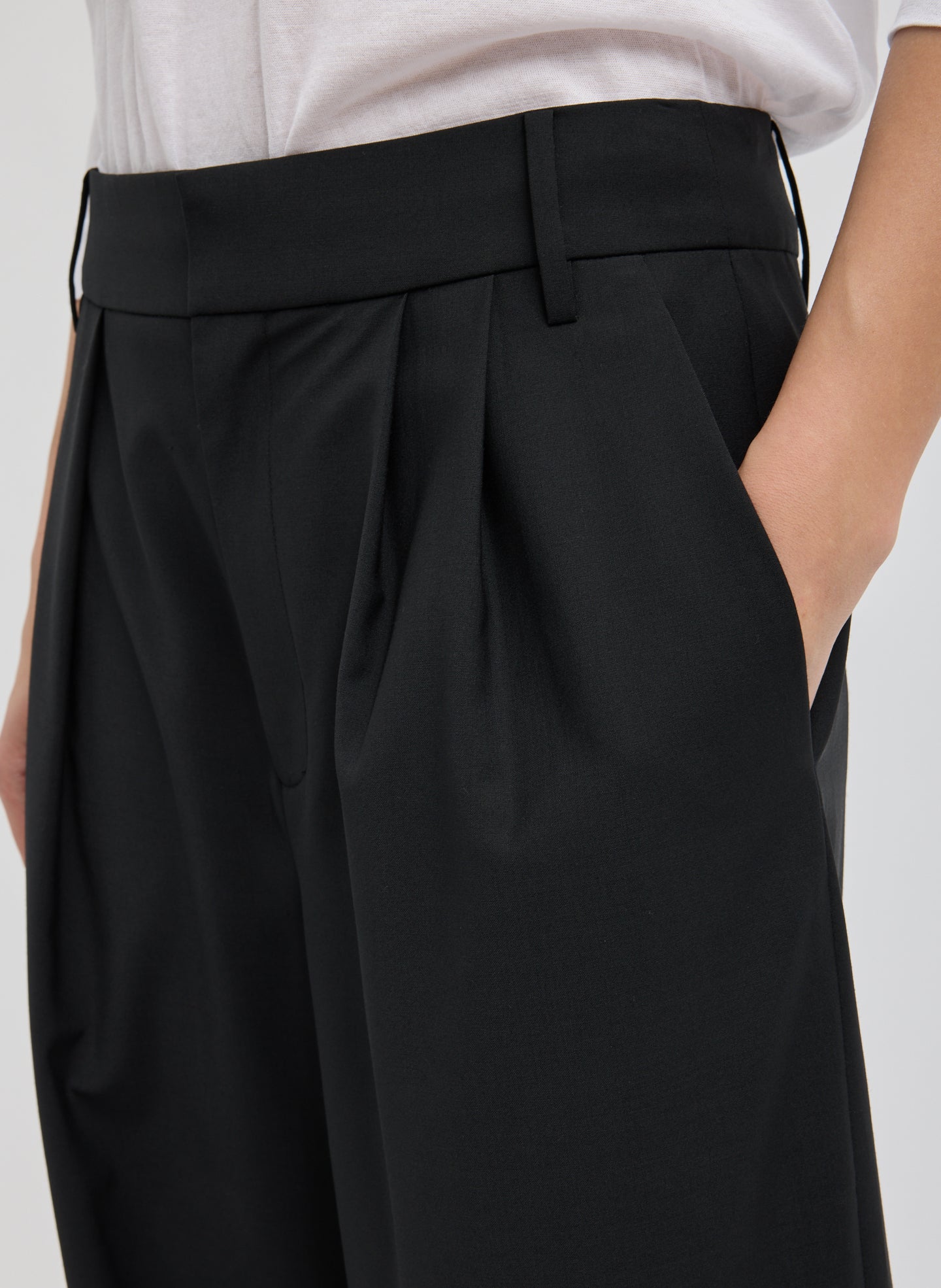Black Tropical Wool Stella Pant - closeup of pleat details
