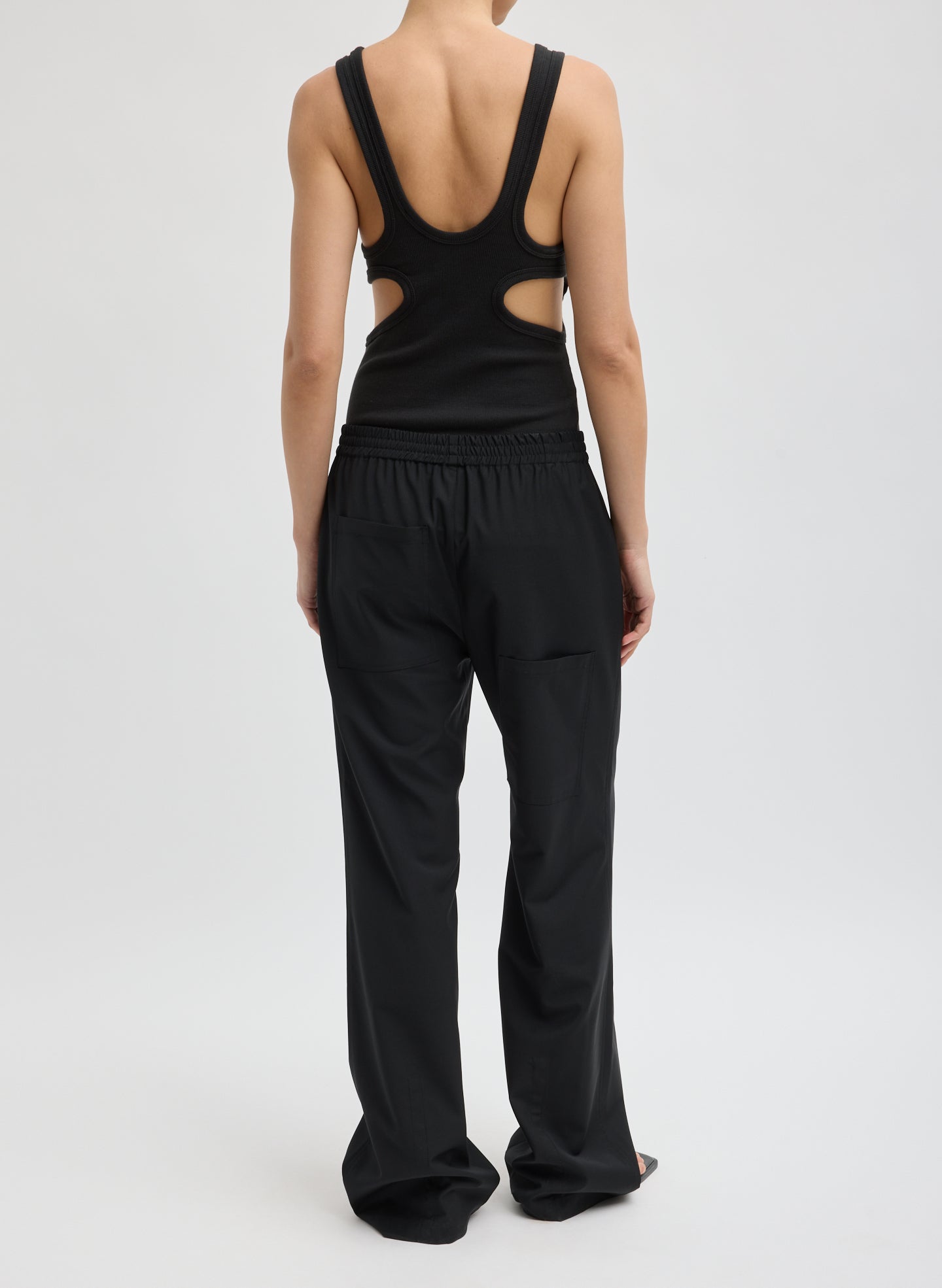 Black Tropical Wool Scottie Jogger - pull on trousers, back view on model