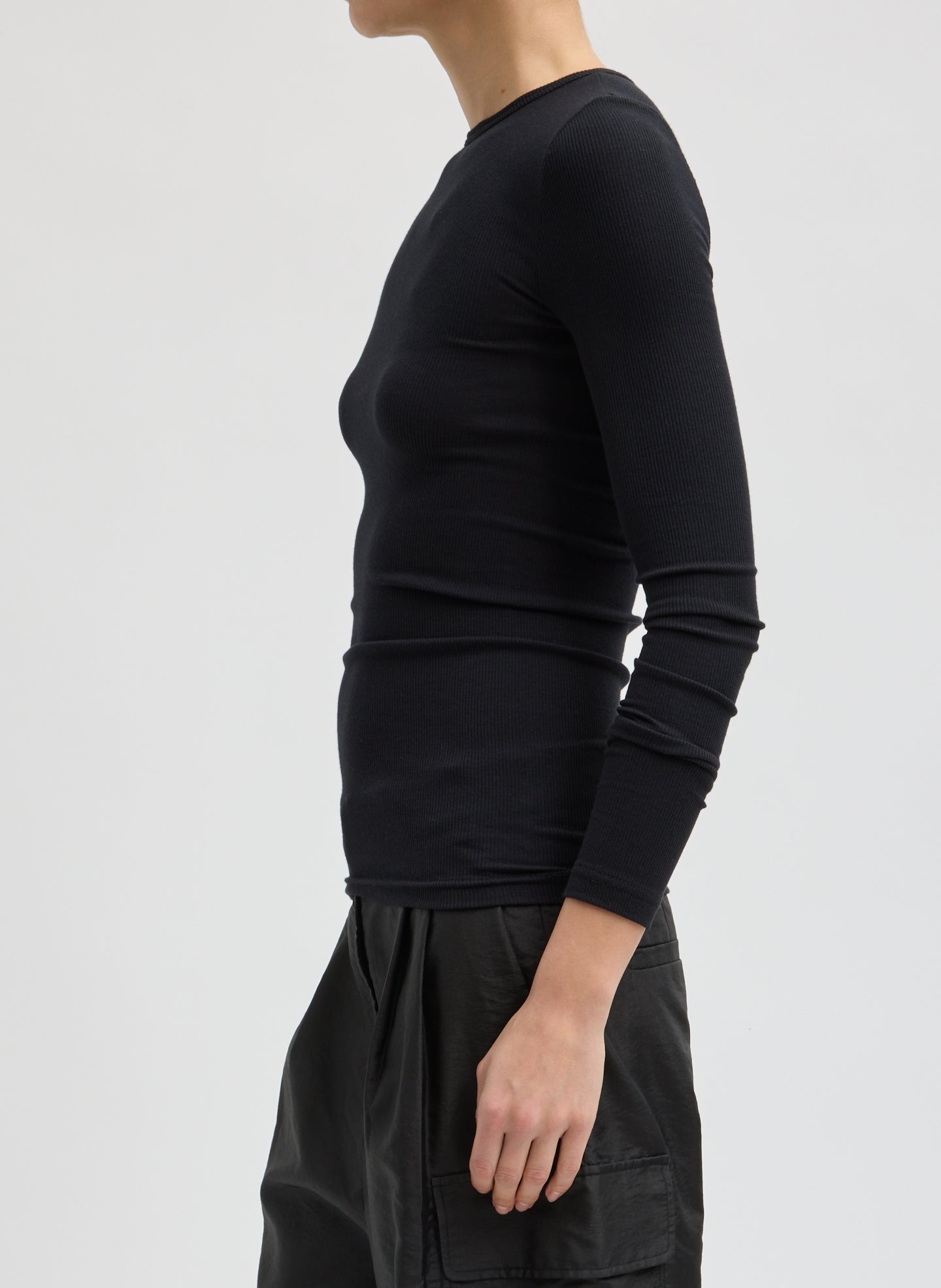 Black Circular Ribbed Crewneck Pullover T-Shirt - long sleeve t-shirt, side view on model
