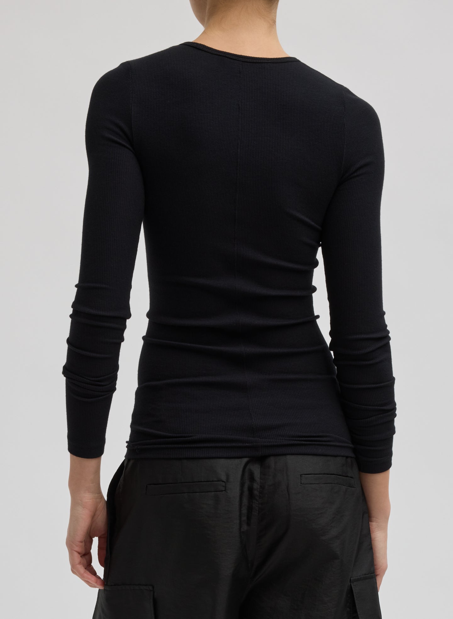 Black Circular Ribbed Crewneck Pullover T-Shirt - long sleeve t-shirt, back view on model