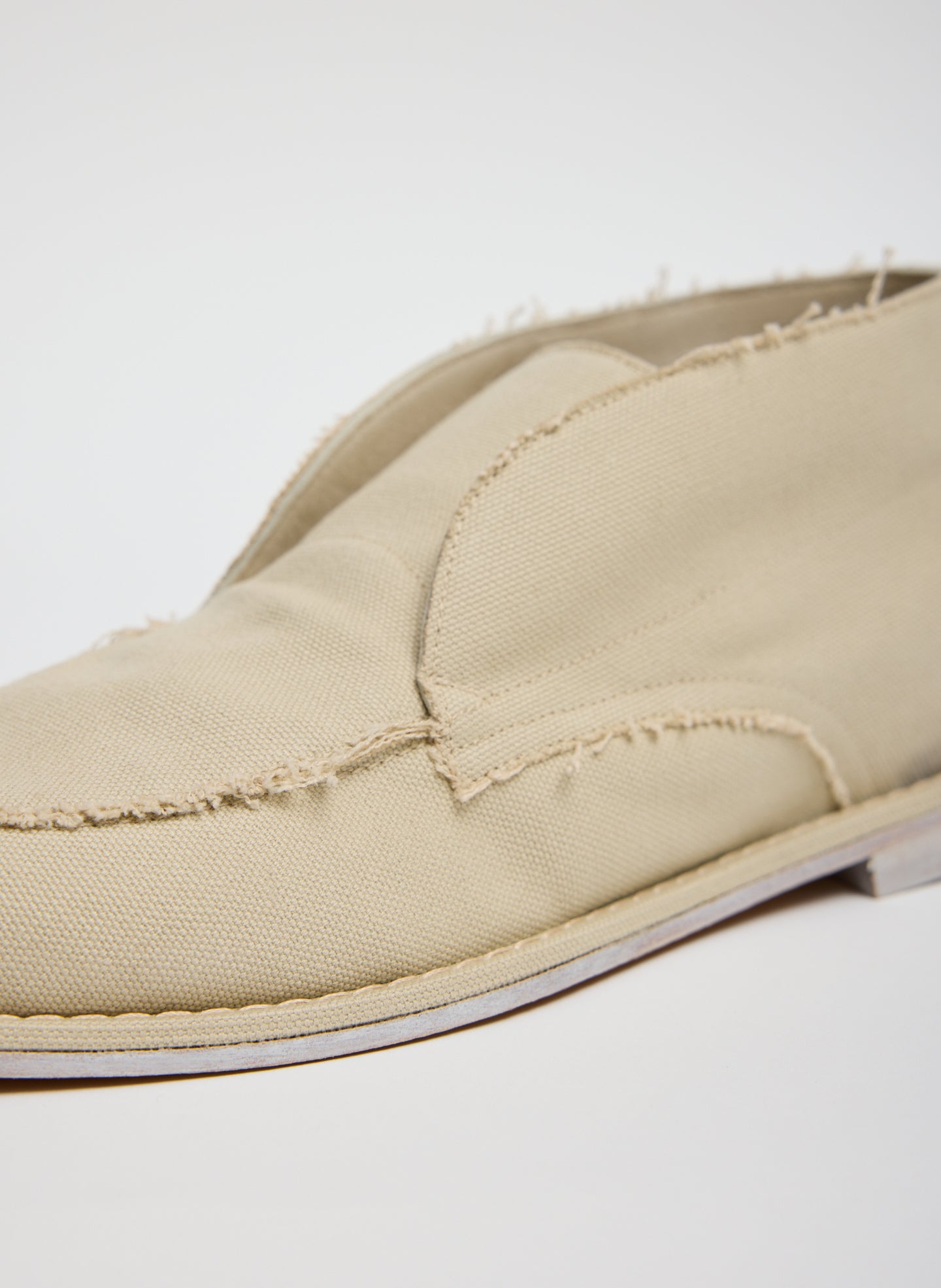 Sand Canvas Harry Chukka boot - closeup of frayed detail