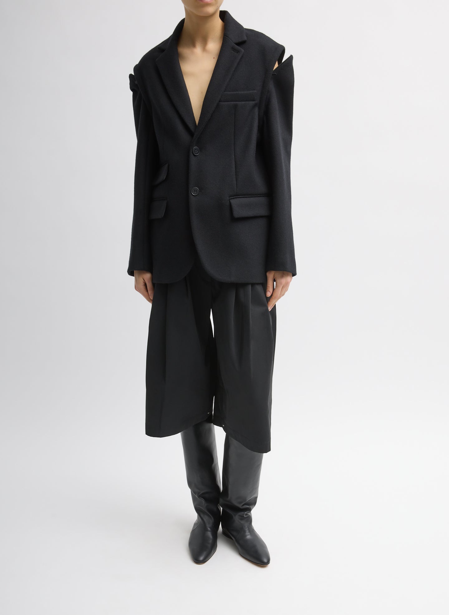Black Bonded Recycled Felted Wool Convertible Blazer - unzipped sleeves, front view on model