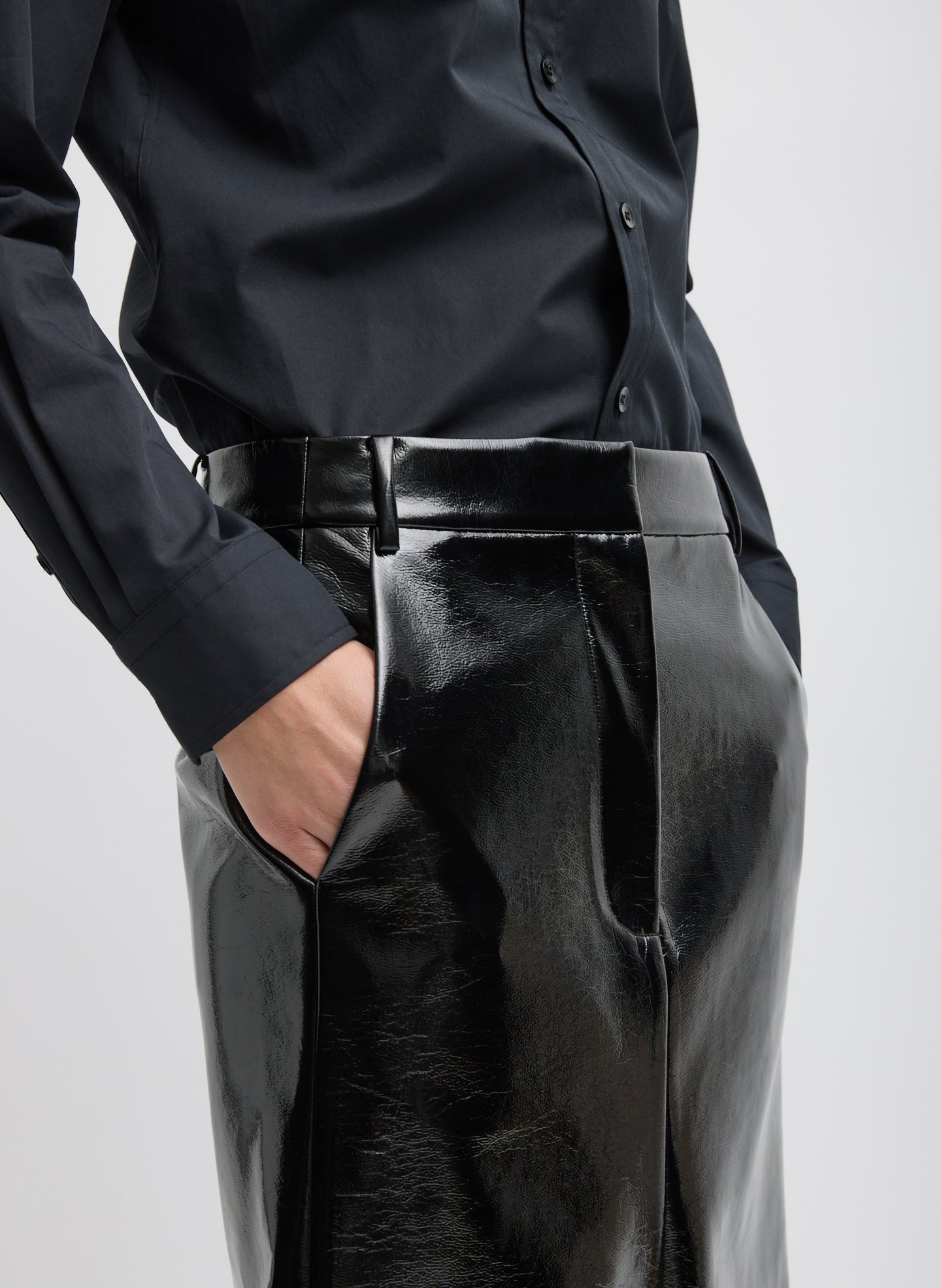 Black Faux Patent Leather Sculpted Silke Skirt - closeup of front waist detail