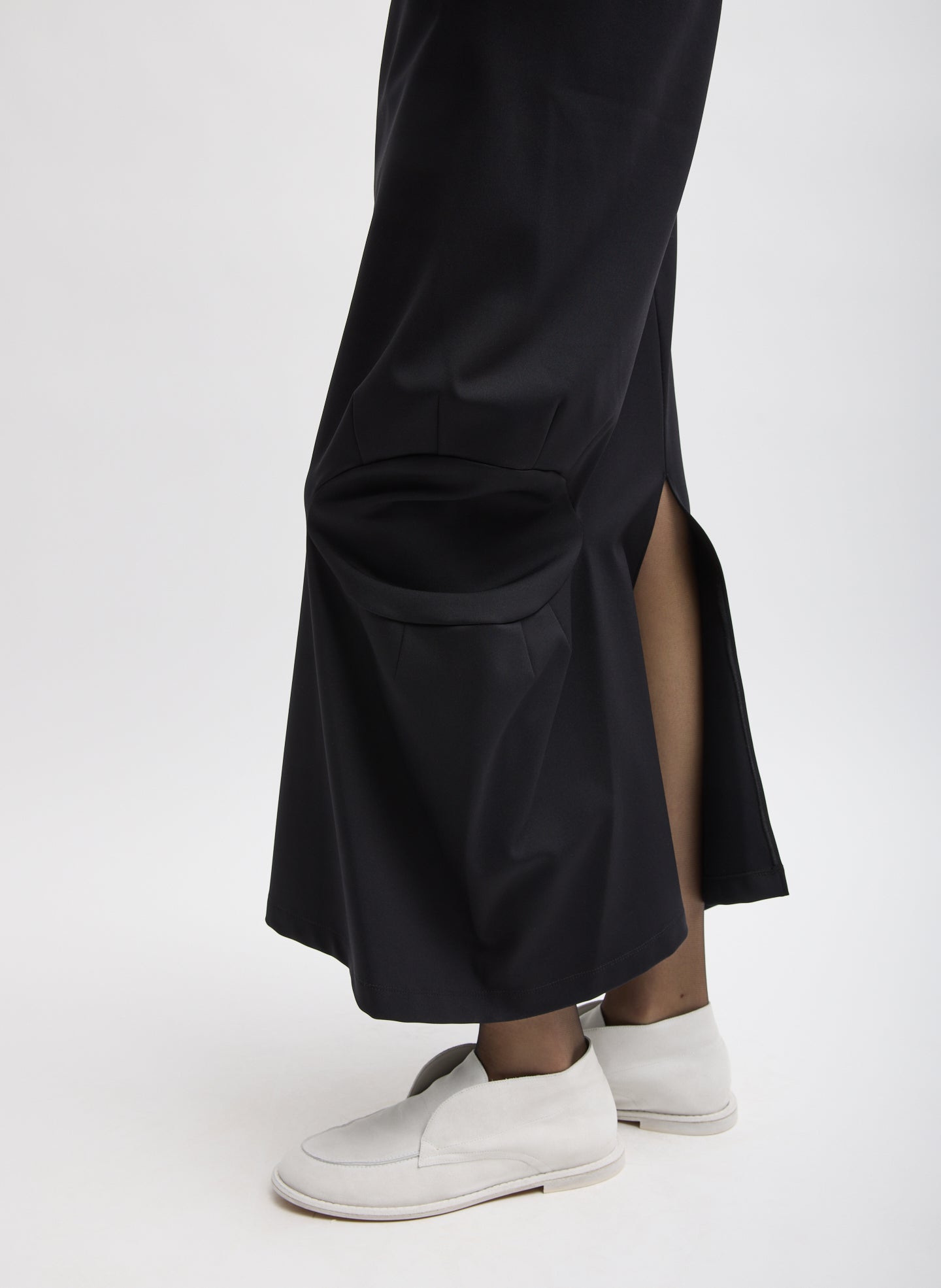 Black Compact Ultra Stretch Knit Sculpted Meir Trouser Skirt - closeup of cutout detail