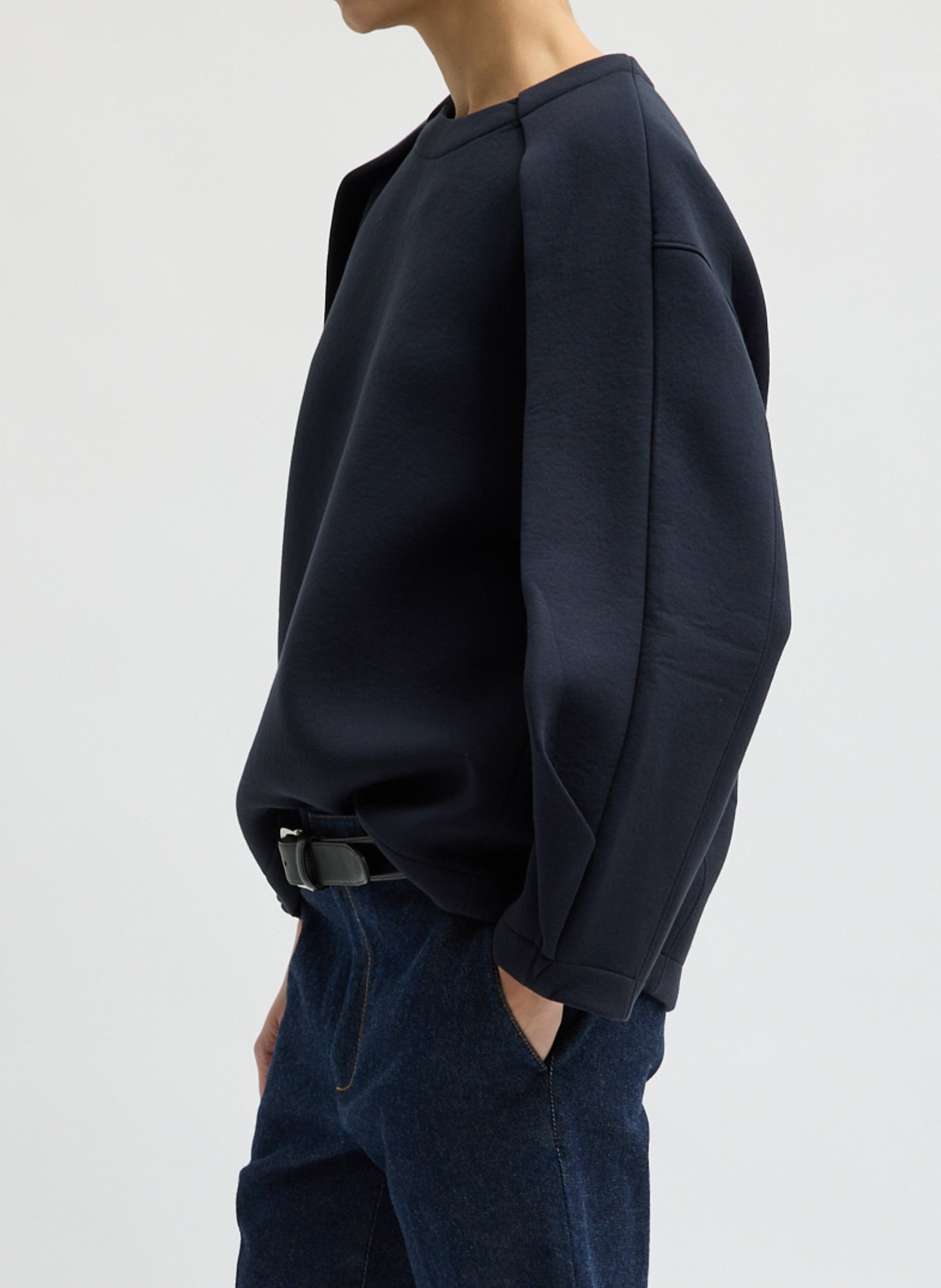 Navy Bonded Viscose Crew Neck with Folded Panel - side view on model