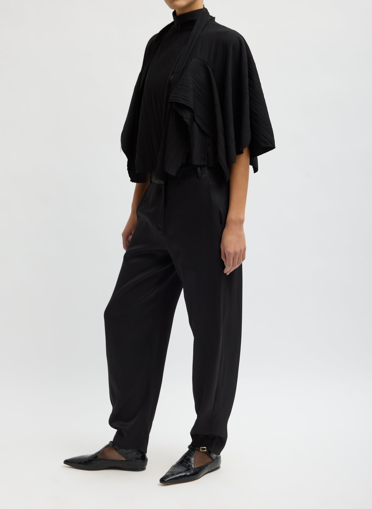 Black Creased Acetate Cape Tie Top - side view on model