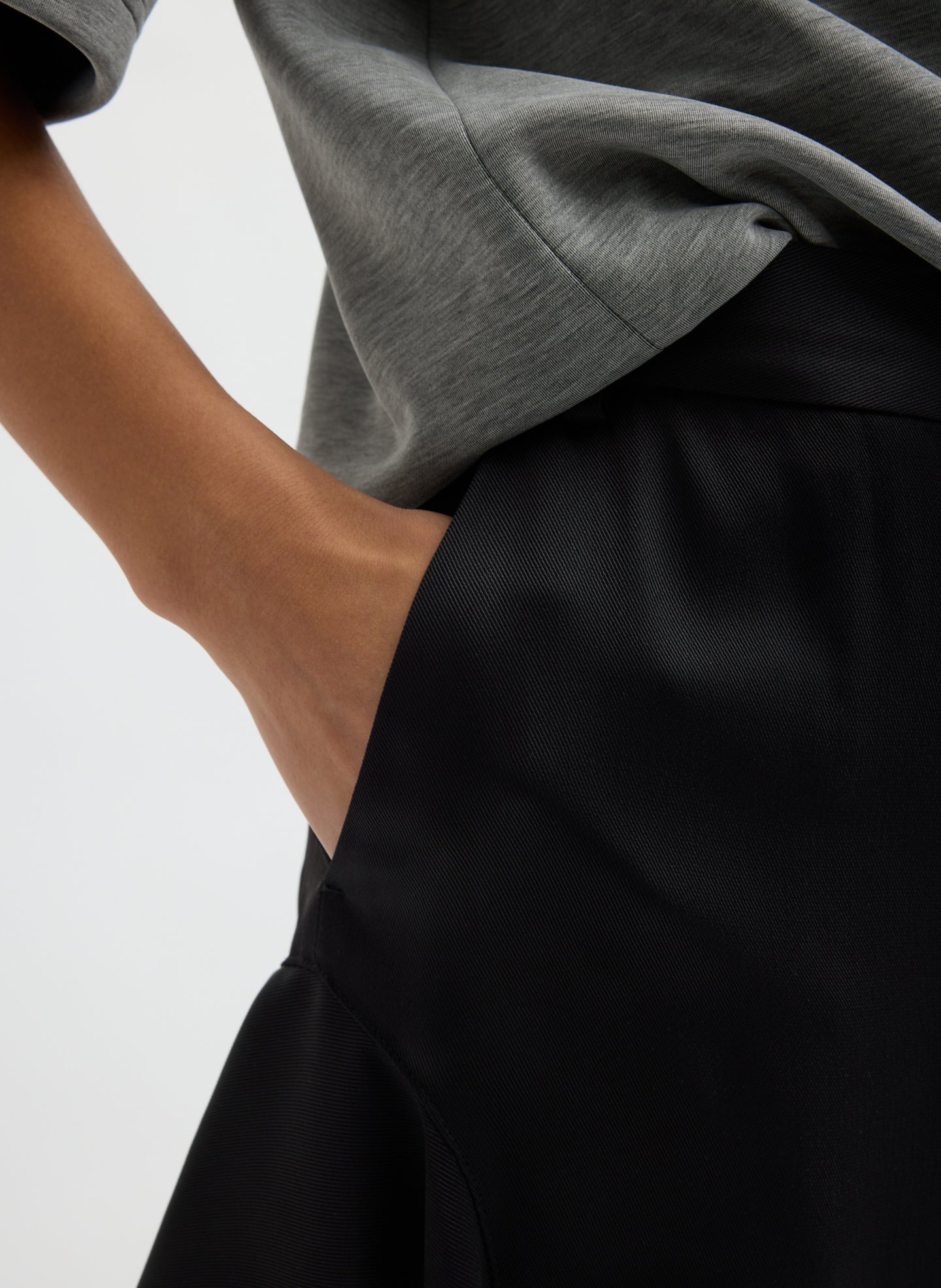 Black Eco Acetate Viscose Side Drape Short - closeup of pocket detail