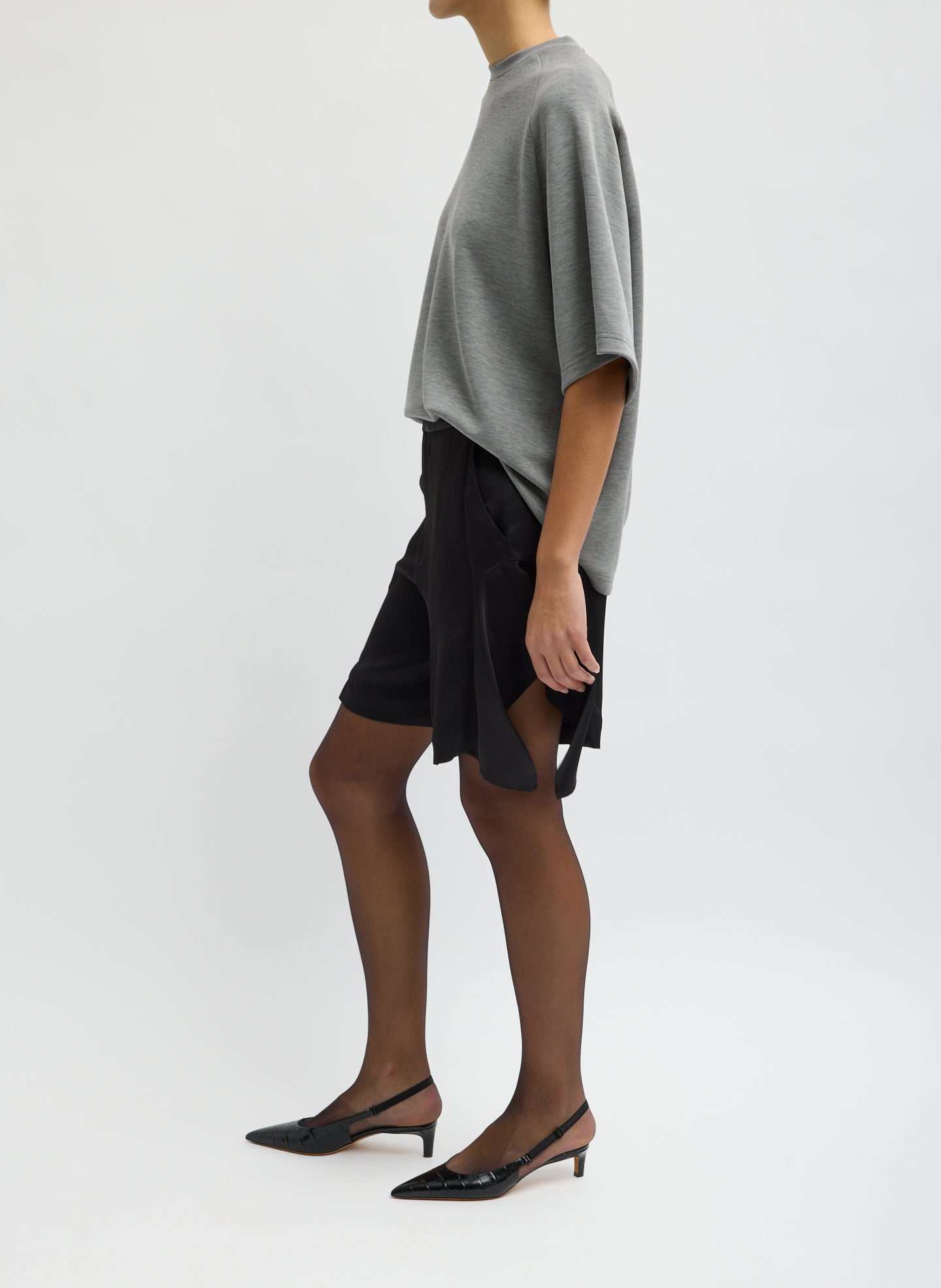 Black Eco Acetate Viscose Side Drape Short - side view on model