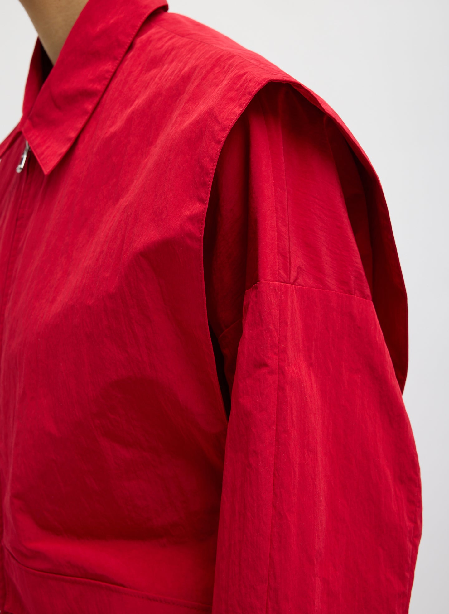 Red Fall Nylon Snap Bomber Jacket - closeup of sleeve detail
