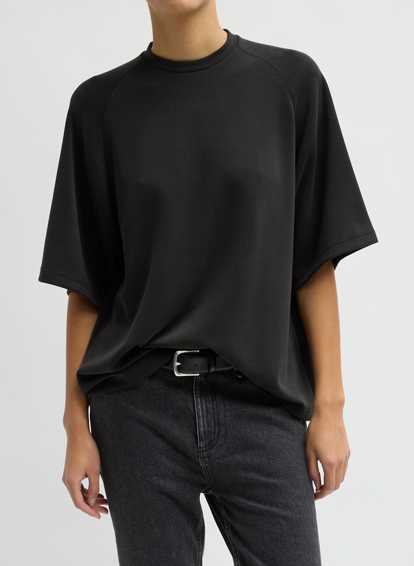 Black Feather Weight Viscose Neoprene Short Sleeve Baseball T-Shirt - front view on model