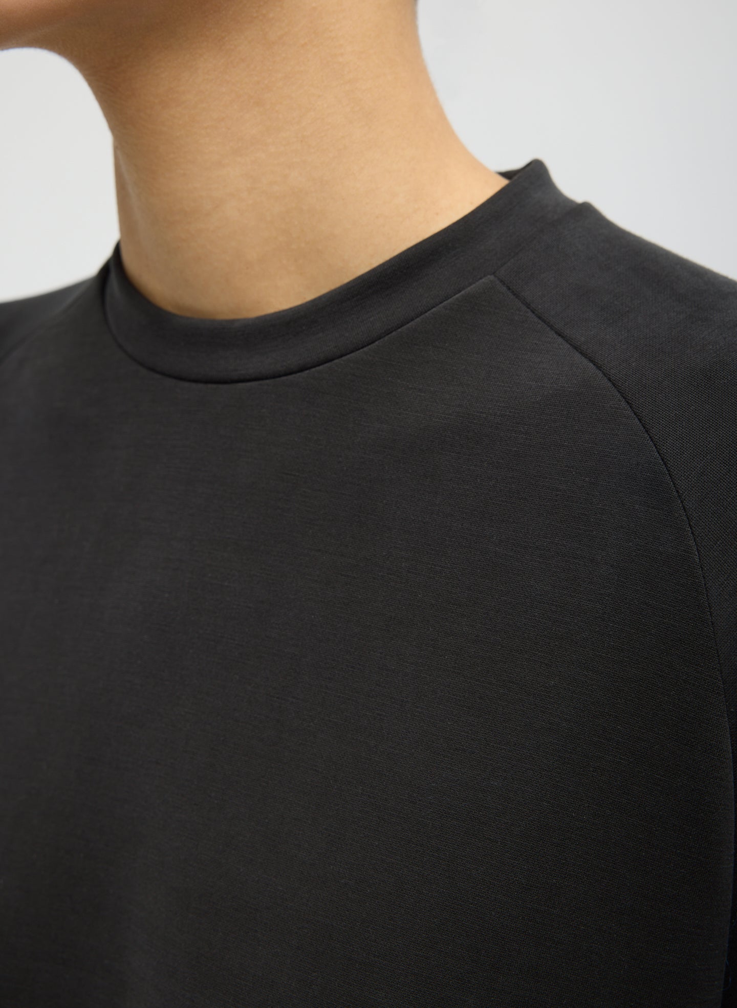 Black Feather Weight Viscose Neoprene Short Sleeve Baseball T-Shirt - closeup of neckline