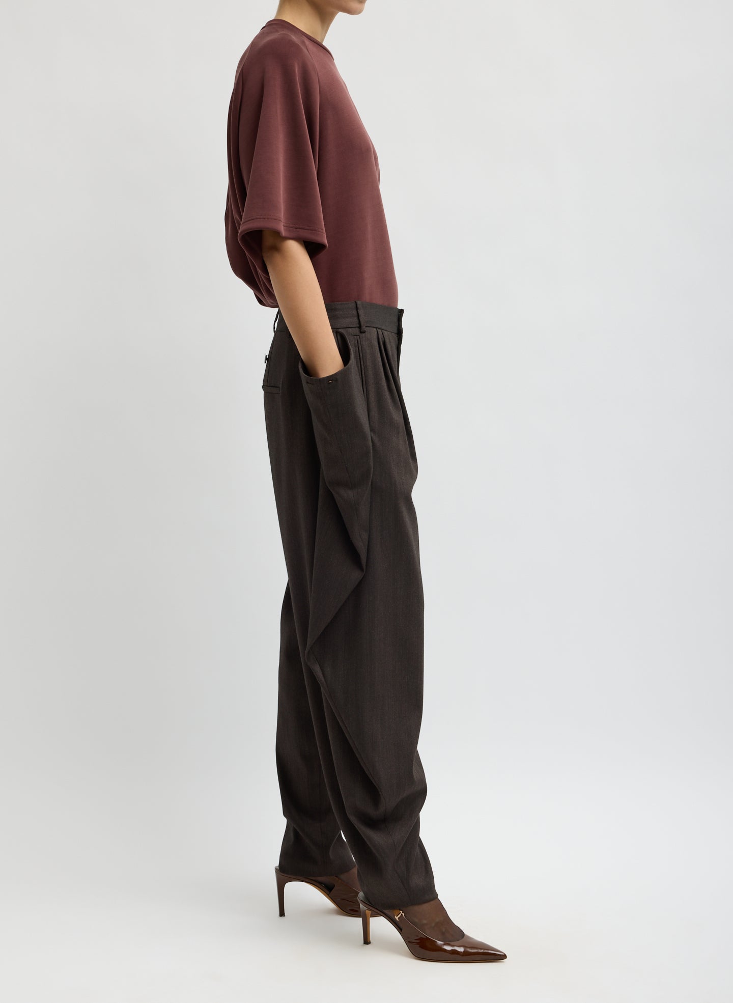 Brown Herringbone Suiting Side Drape Pleated Pant - side view on model