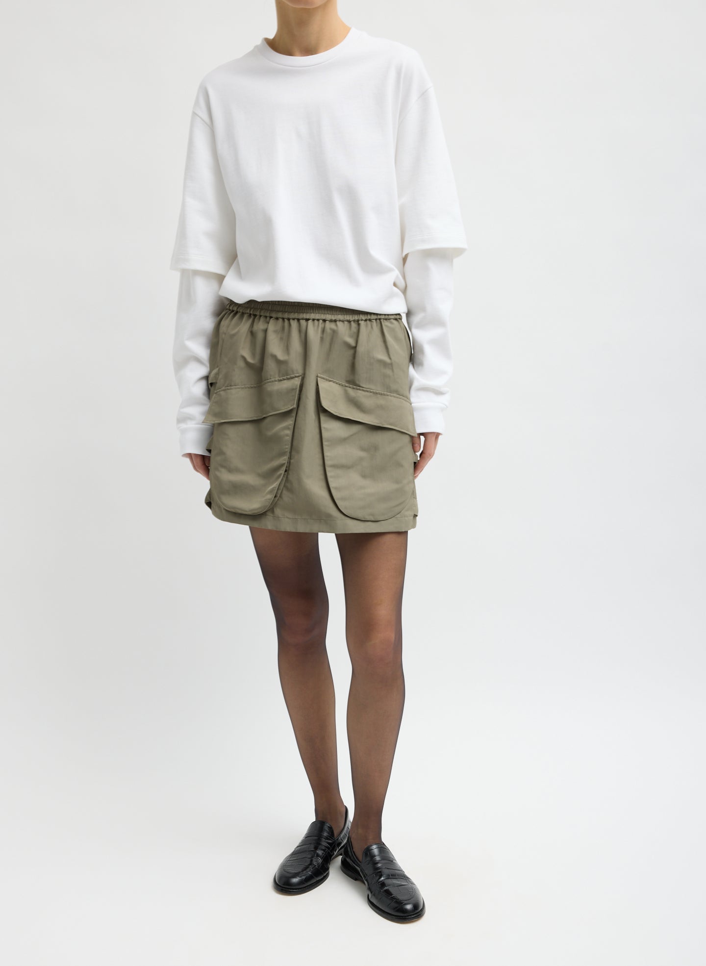 Techy Twill Pull On Mini Skirt - Dark Hazelnut Green Techy Twill Pull On Mini Skirt - front view on model