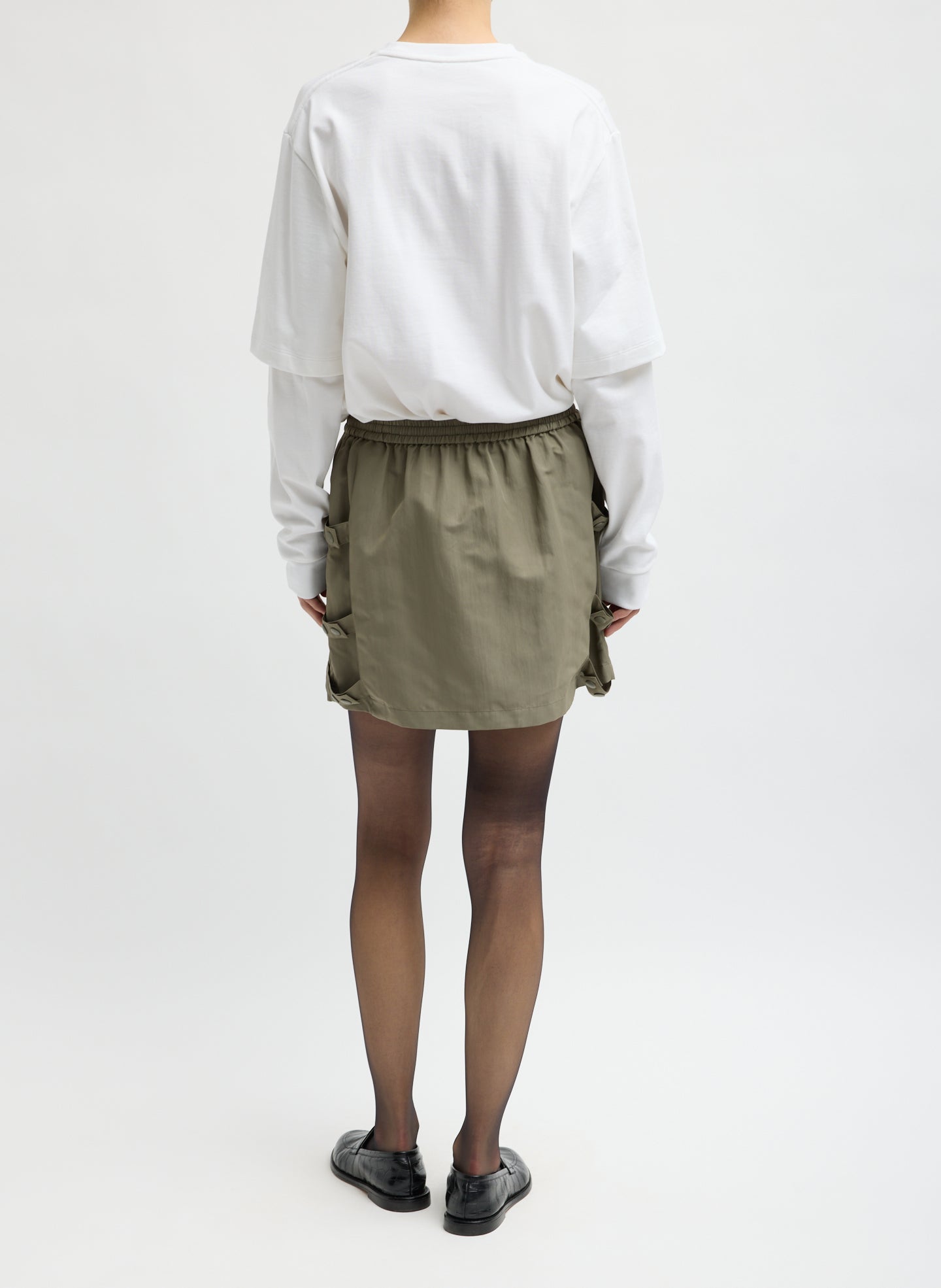 Dark Hazelnut Green Techy Twill Pull On Mini Skirt - back view on model