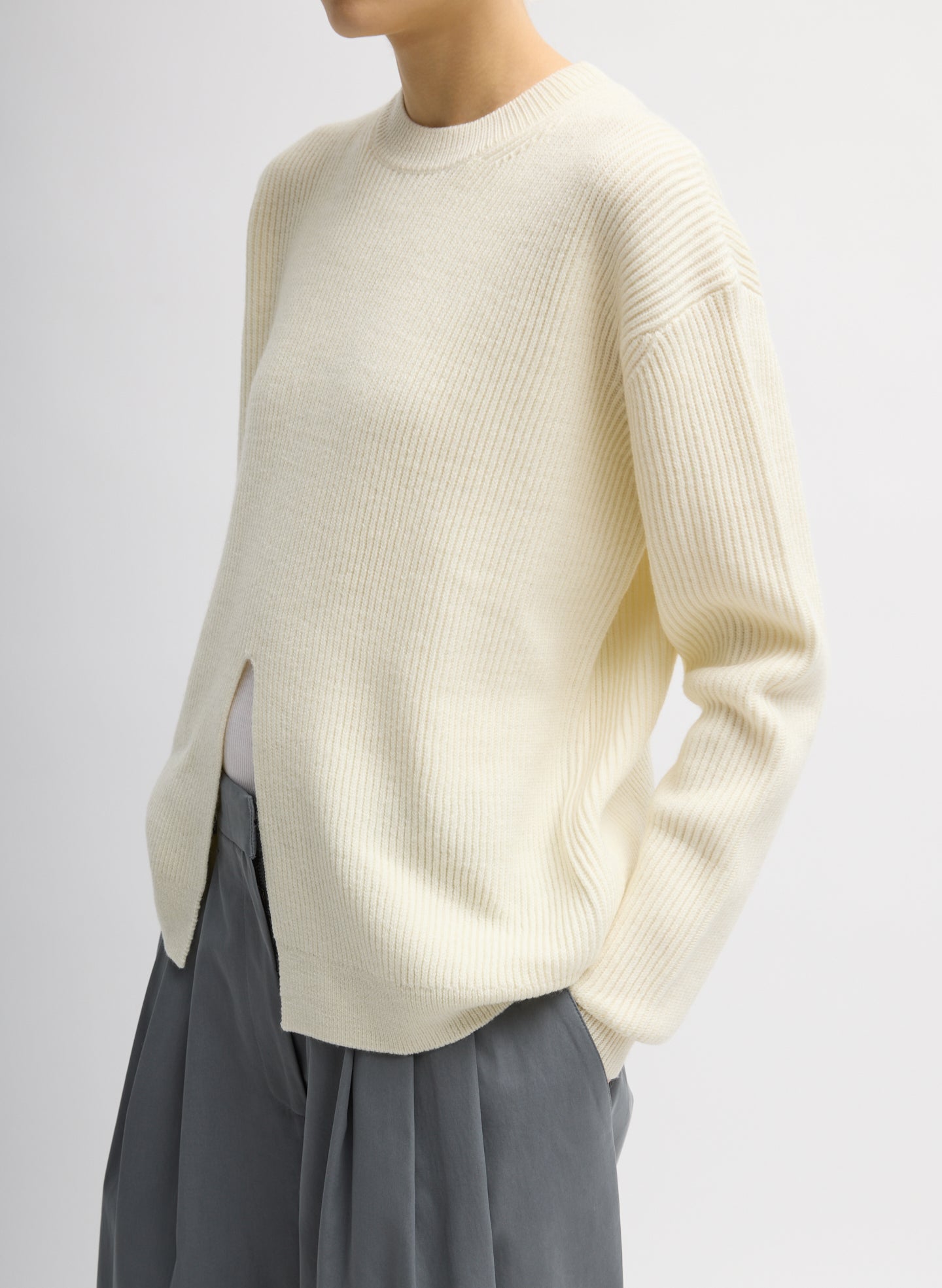 Ivory Cardigan Stitch Split Front Crewneck Easy Pullover - side view on model