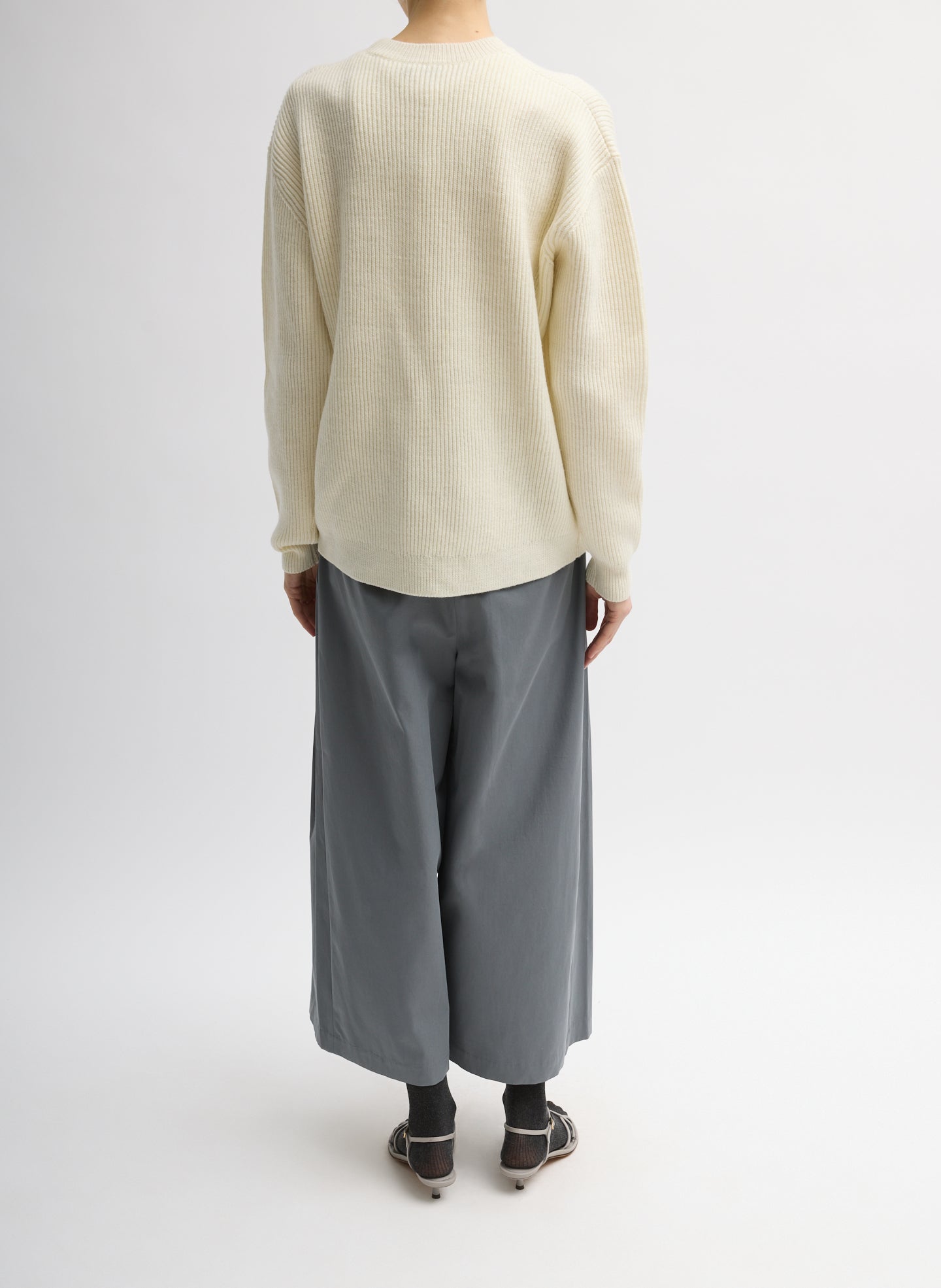 Ivory Cardigan Stitch Split Front Crewneck Easy Pullover - full look, back view on model