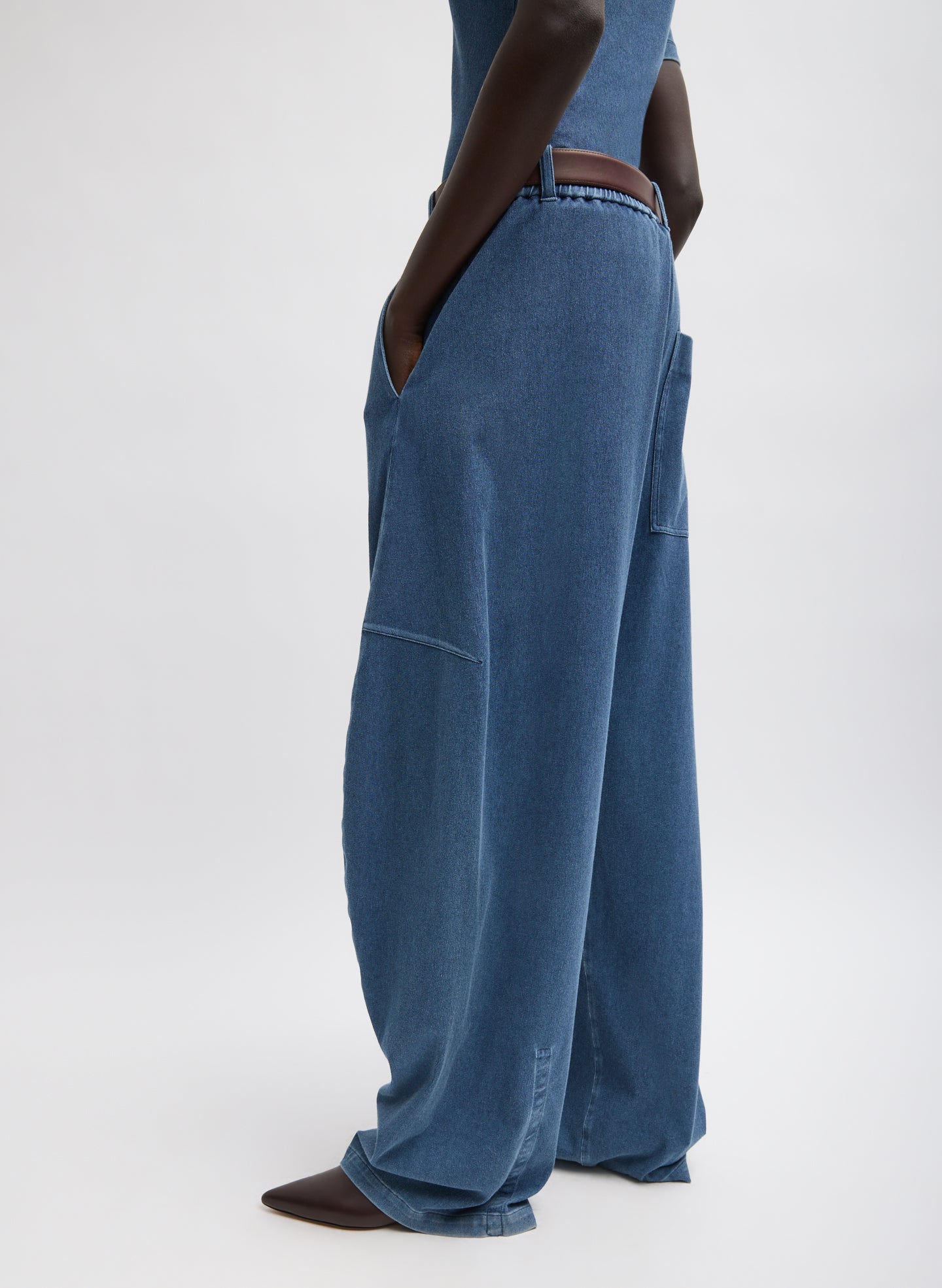 Classic Wash Stretch Denim Knit Winslow Pant - pull on, side view on model