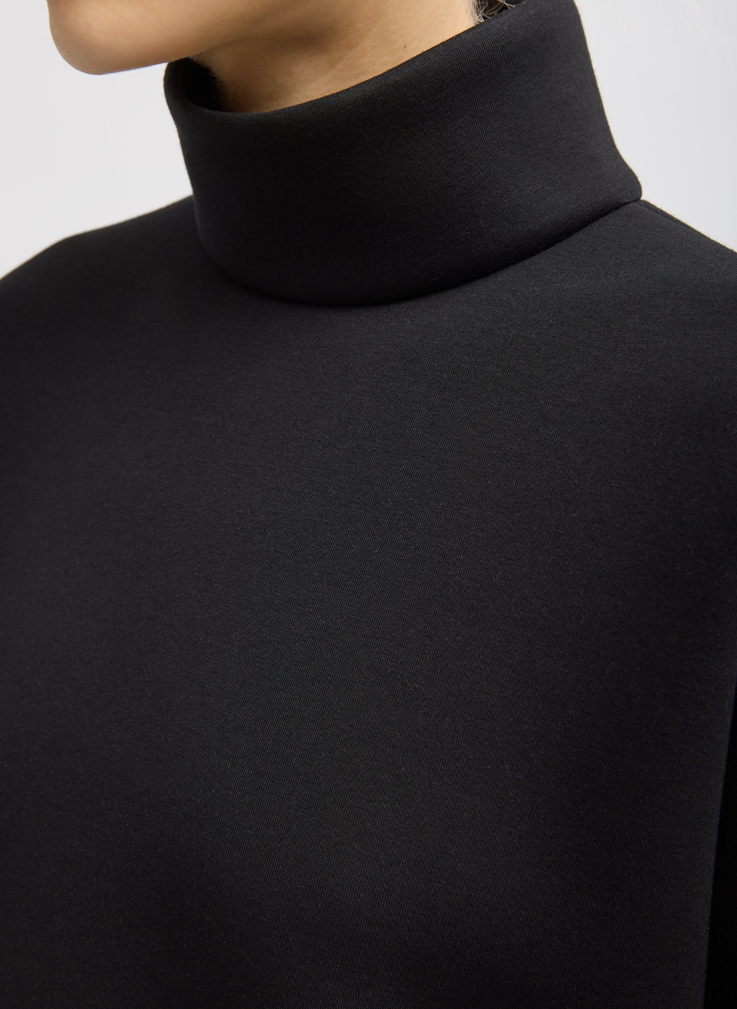 Black Structured Viscose Neck Dolman Sleeve Top - closeup of high neckline