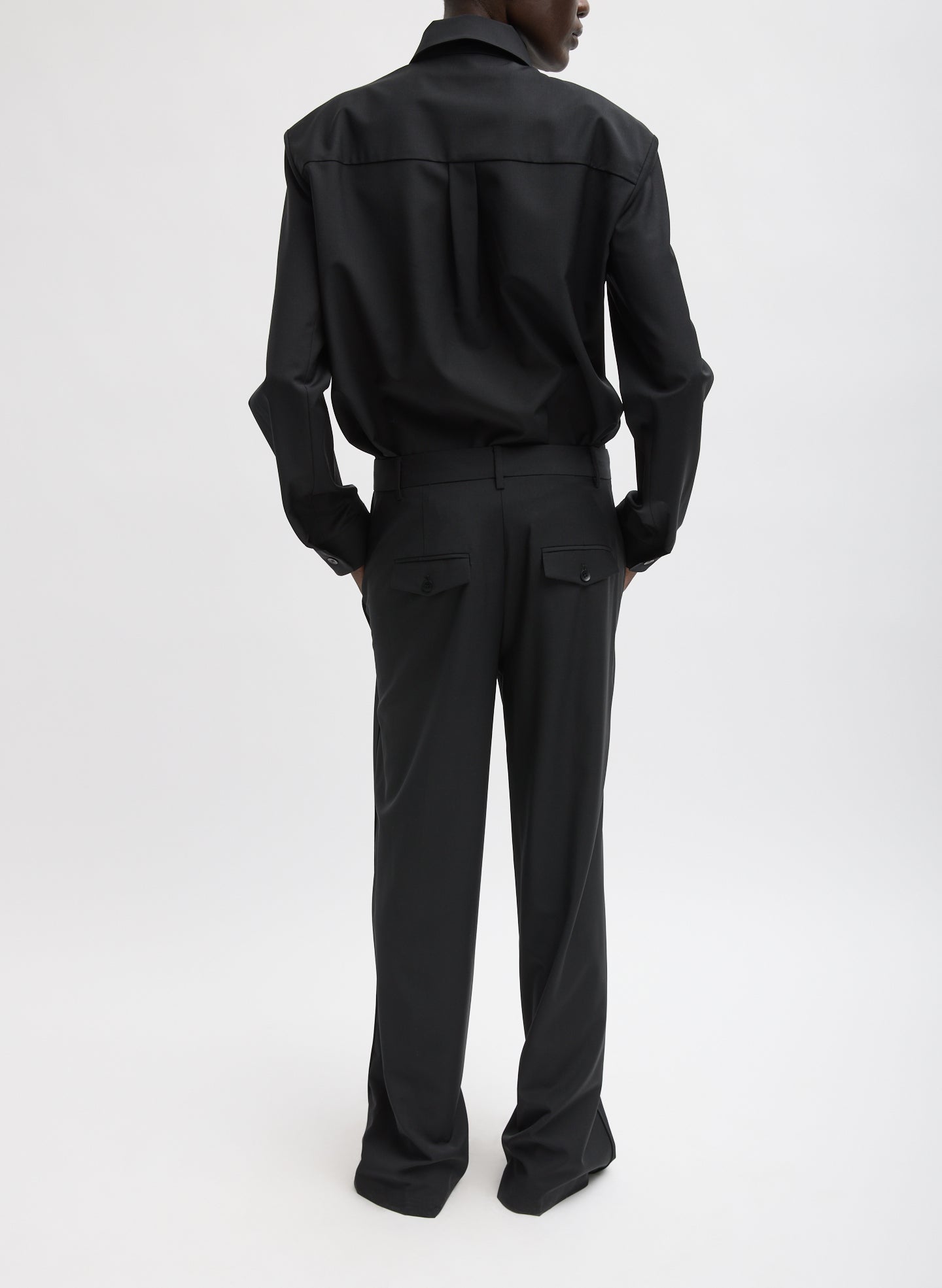 Black Recycled Tropical Wool Jules Trouser - snap hem, full look, back view on model