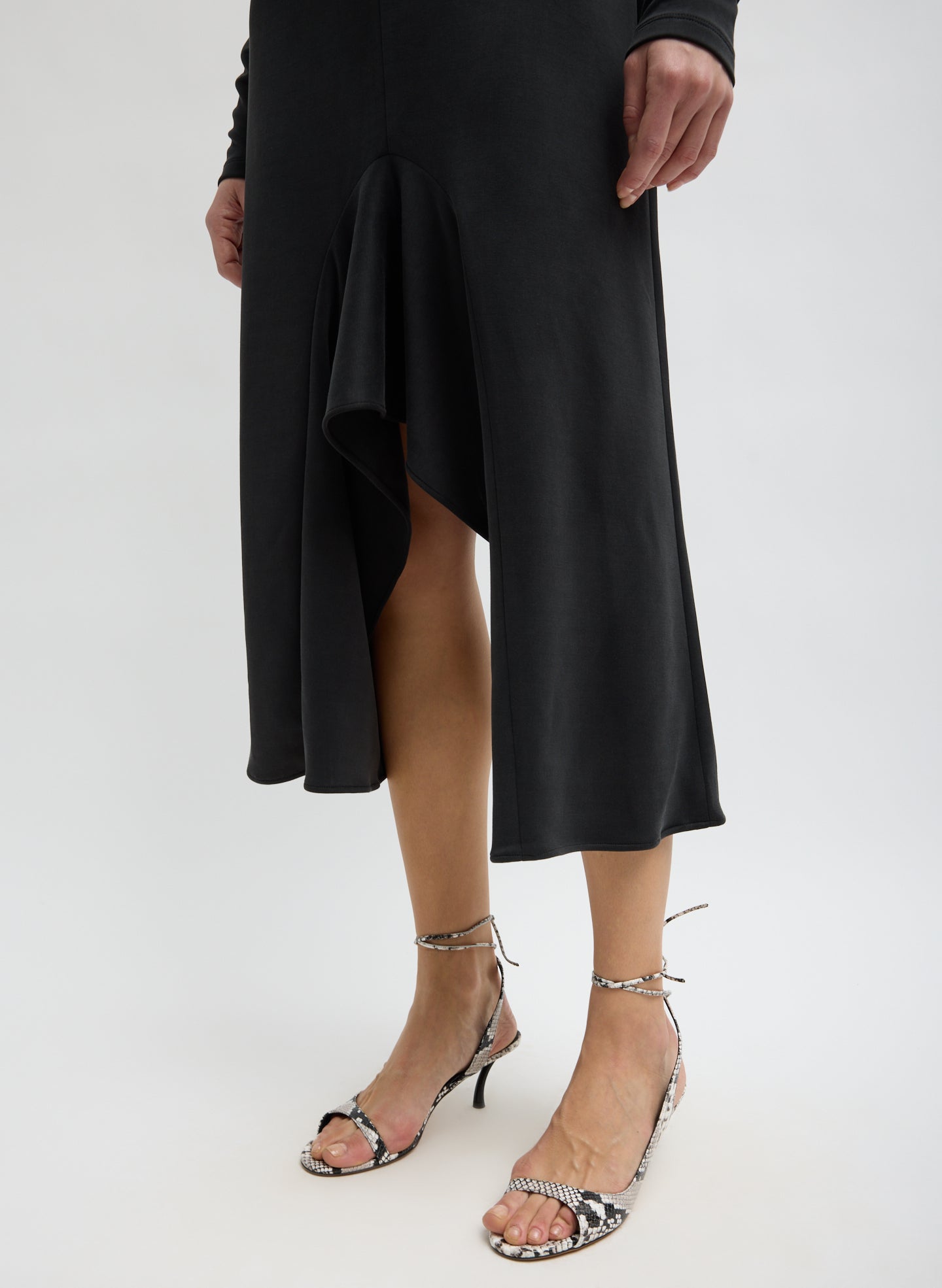 Black Feather Weight Viscose Neoprene Front Drape Dress - closeup of draped front