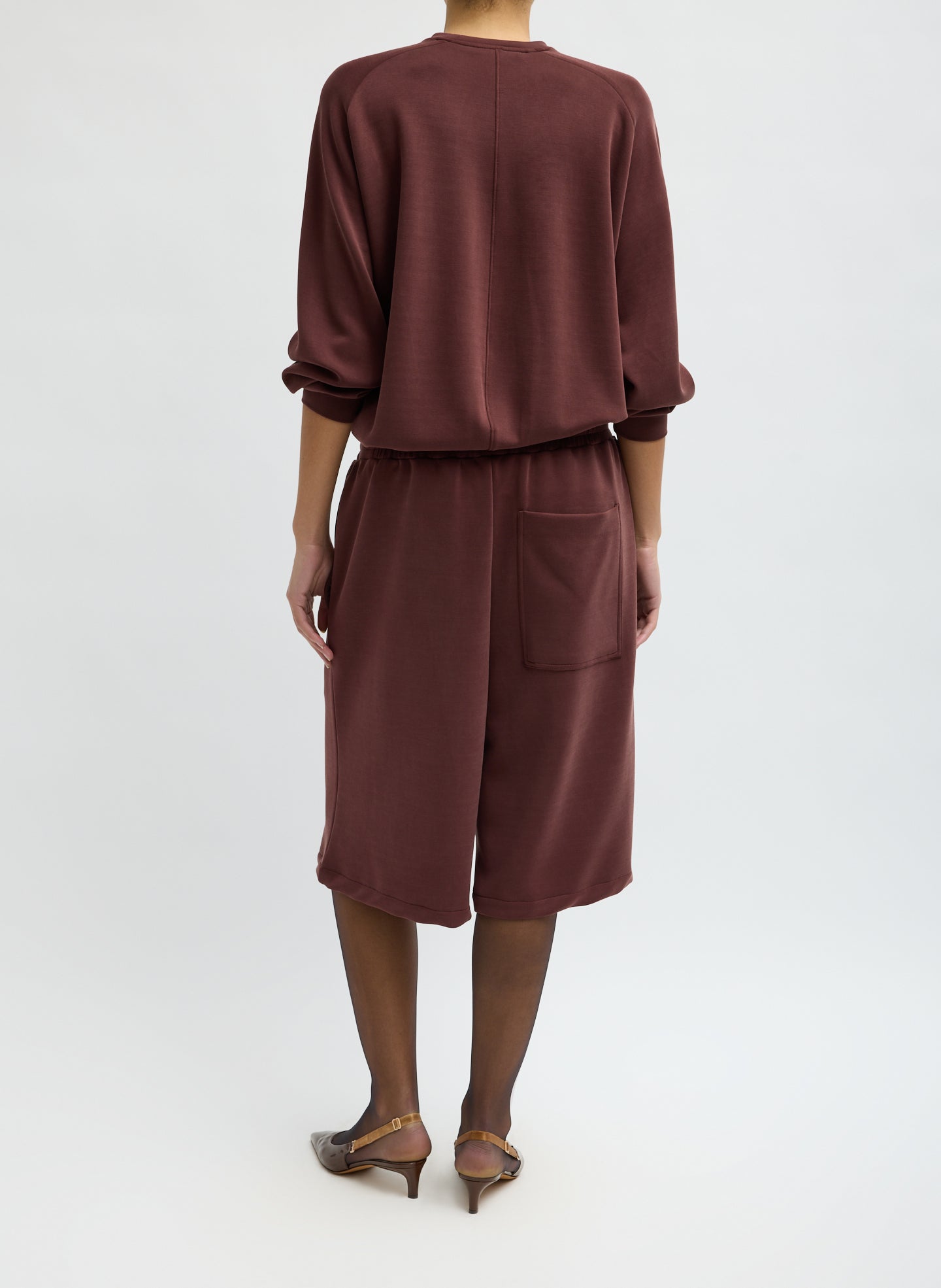 Bordeaux Feather Weight Viscose Neoprene Relaxed Short - long sweat short, back view on model
