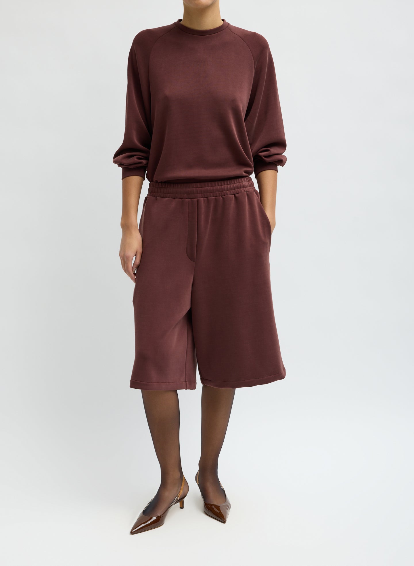 Bordeaux Feather Weight Viscose Neoprene Relaxed Short - long sweat short, front view on model
