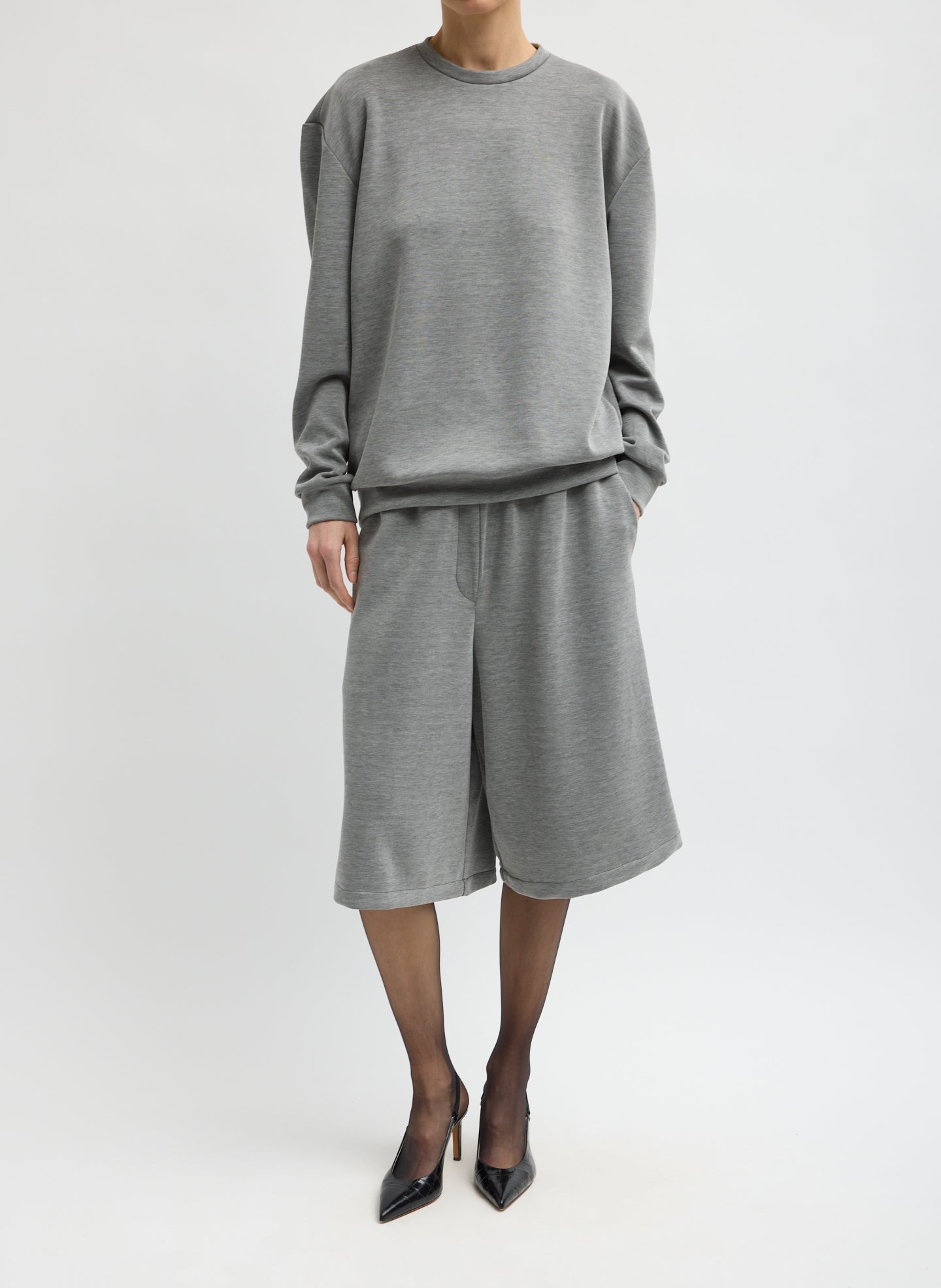 Heather Grey Feather Weight Viscose Neoprene Relaxed Short - long sweat short, front view on model