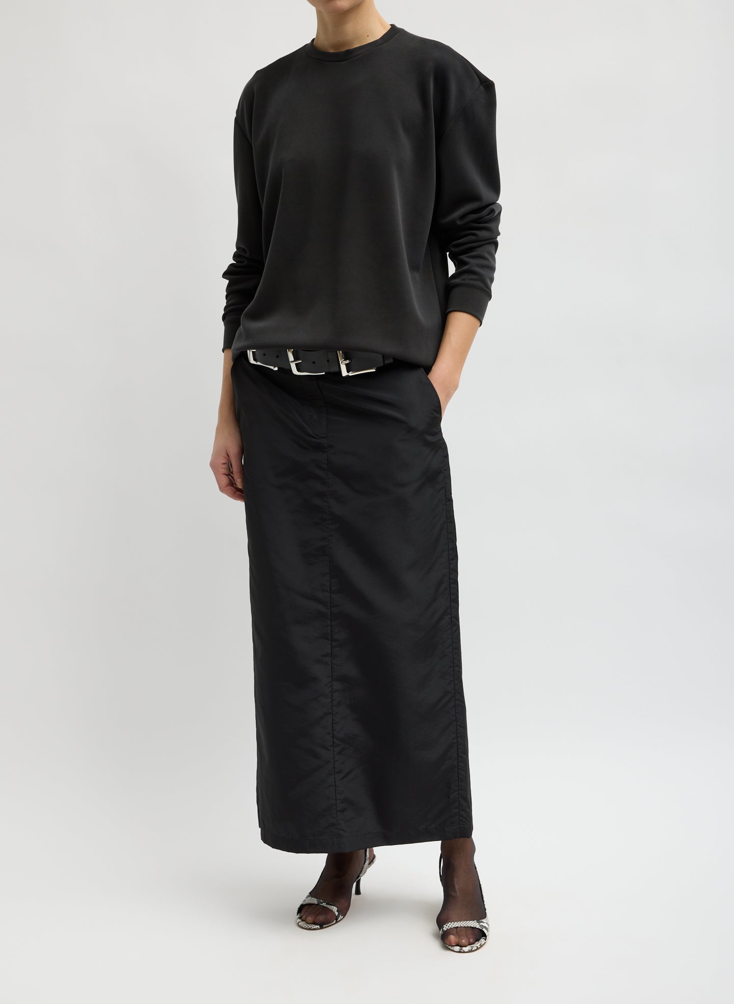 Black Feather Weight Viscose Removable Shoulder Pad Long Sleeve T-Shirt - front view on model