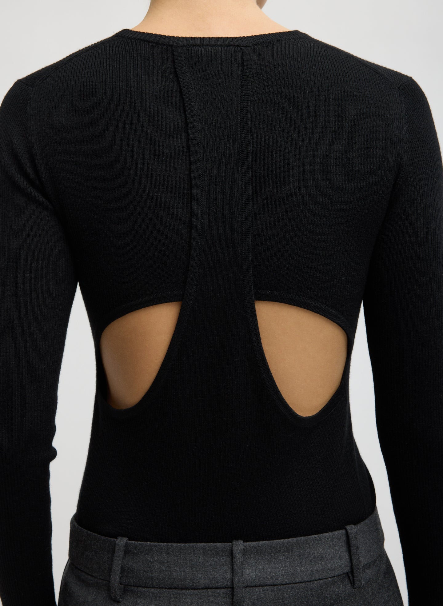 Black Feather Weight Long Sleeve Top - closeup of cutout detail at back